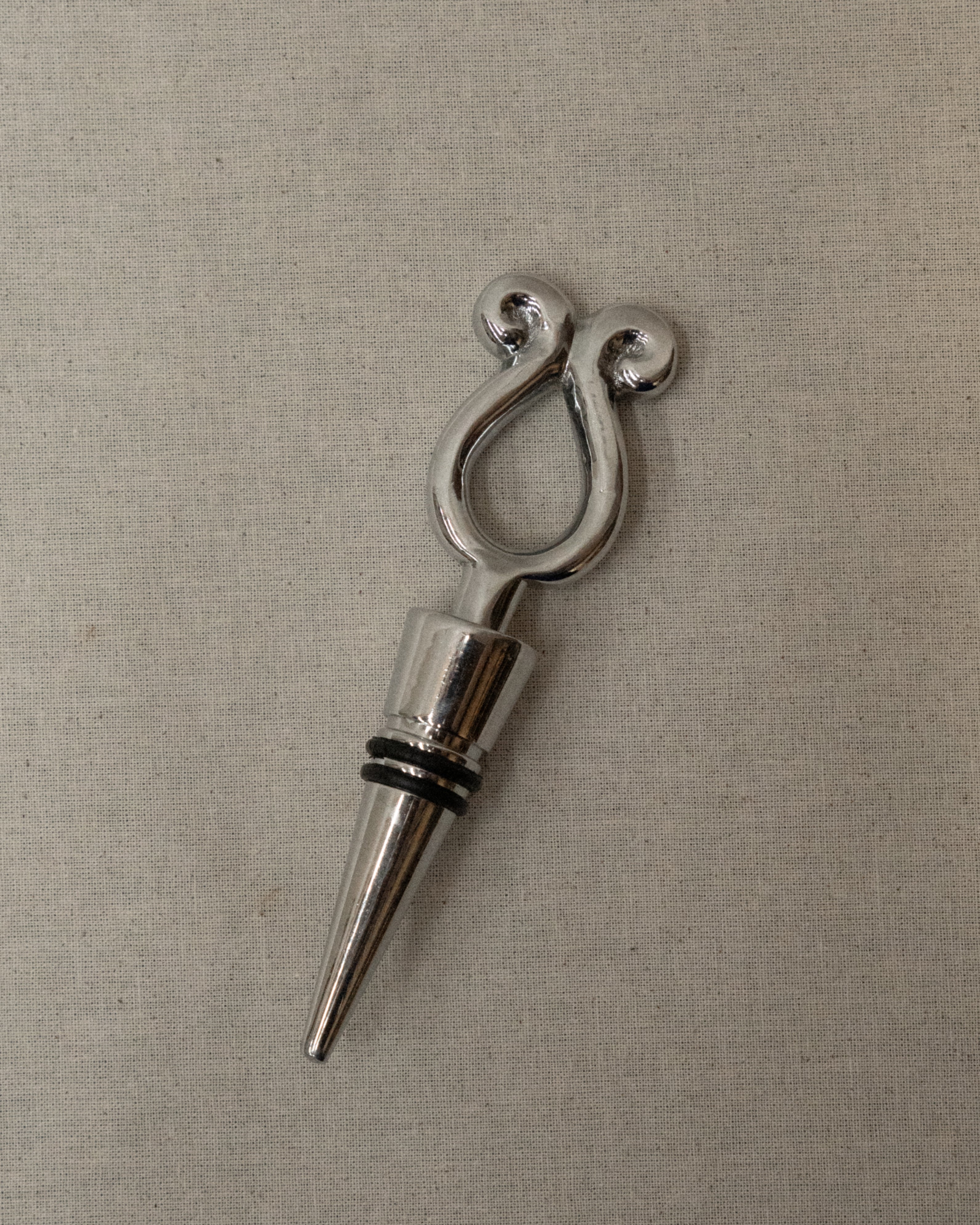 Metal wine stopper with spirals