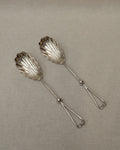 Silver plated shell servers with spiral heart handles