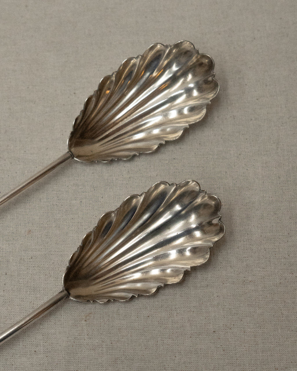 Silver plated shell servers with spiral heart handles