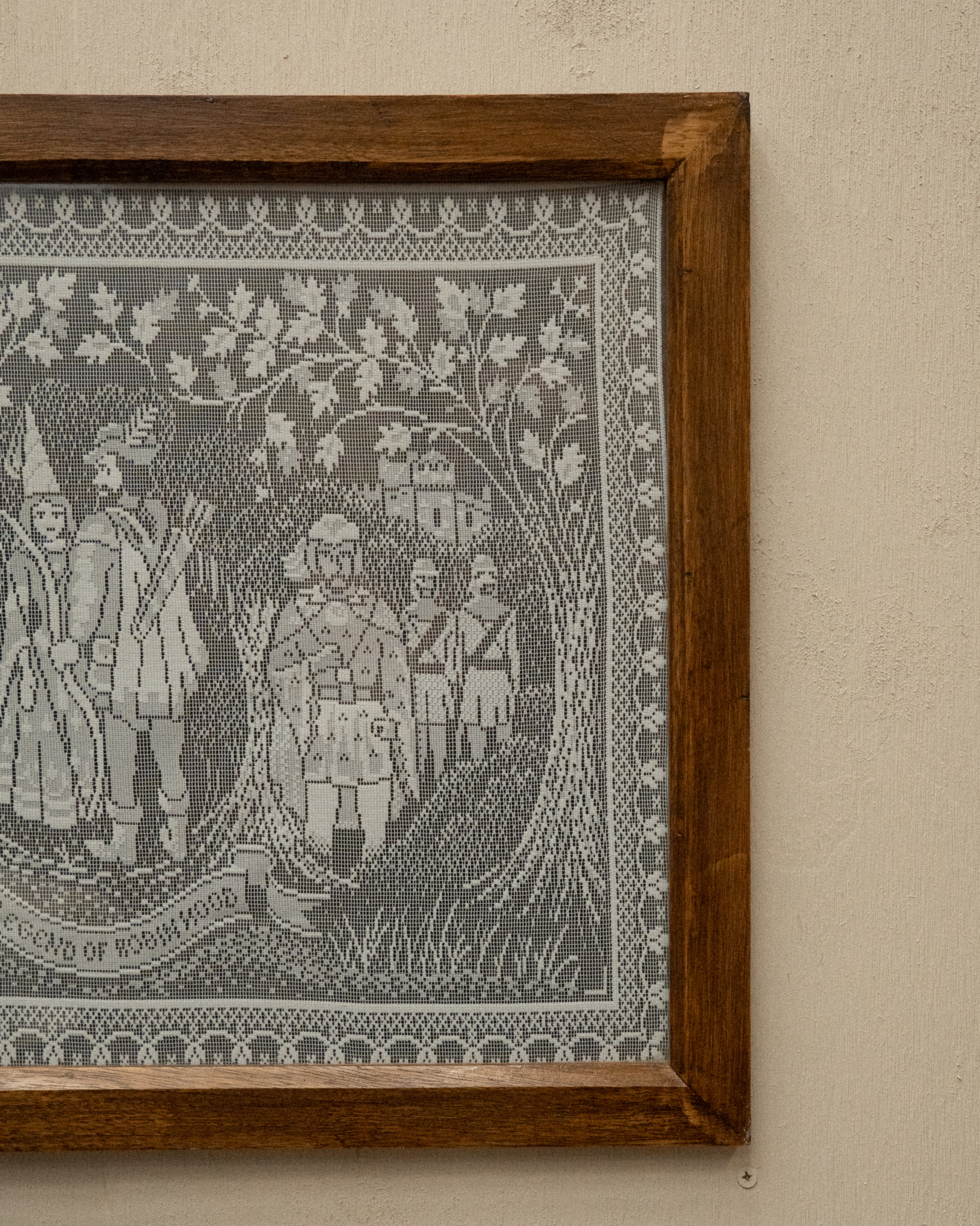 Crochet artwork of Robinhood in wooden frame