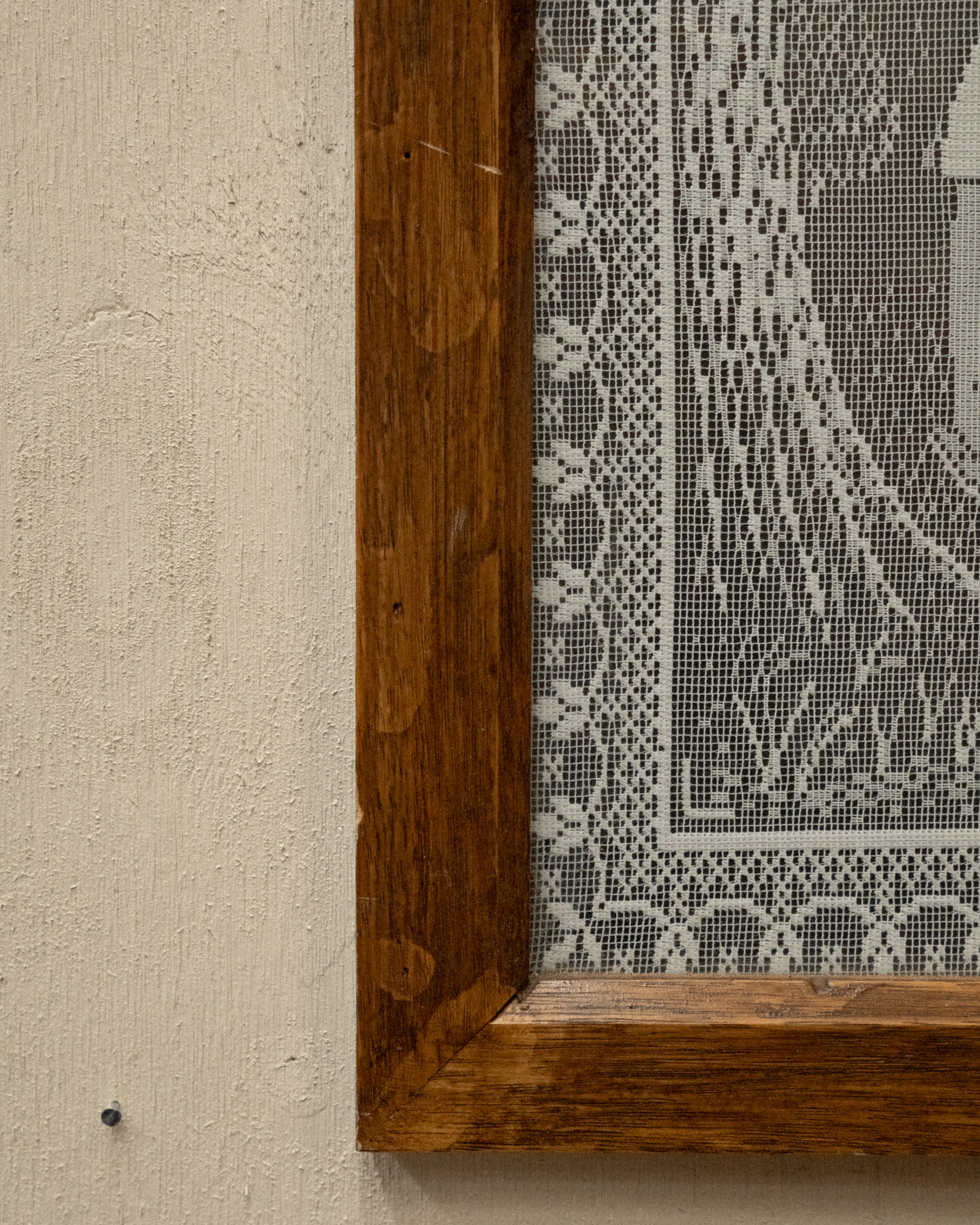 Crochet artwork of Robinhood in wooden frame