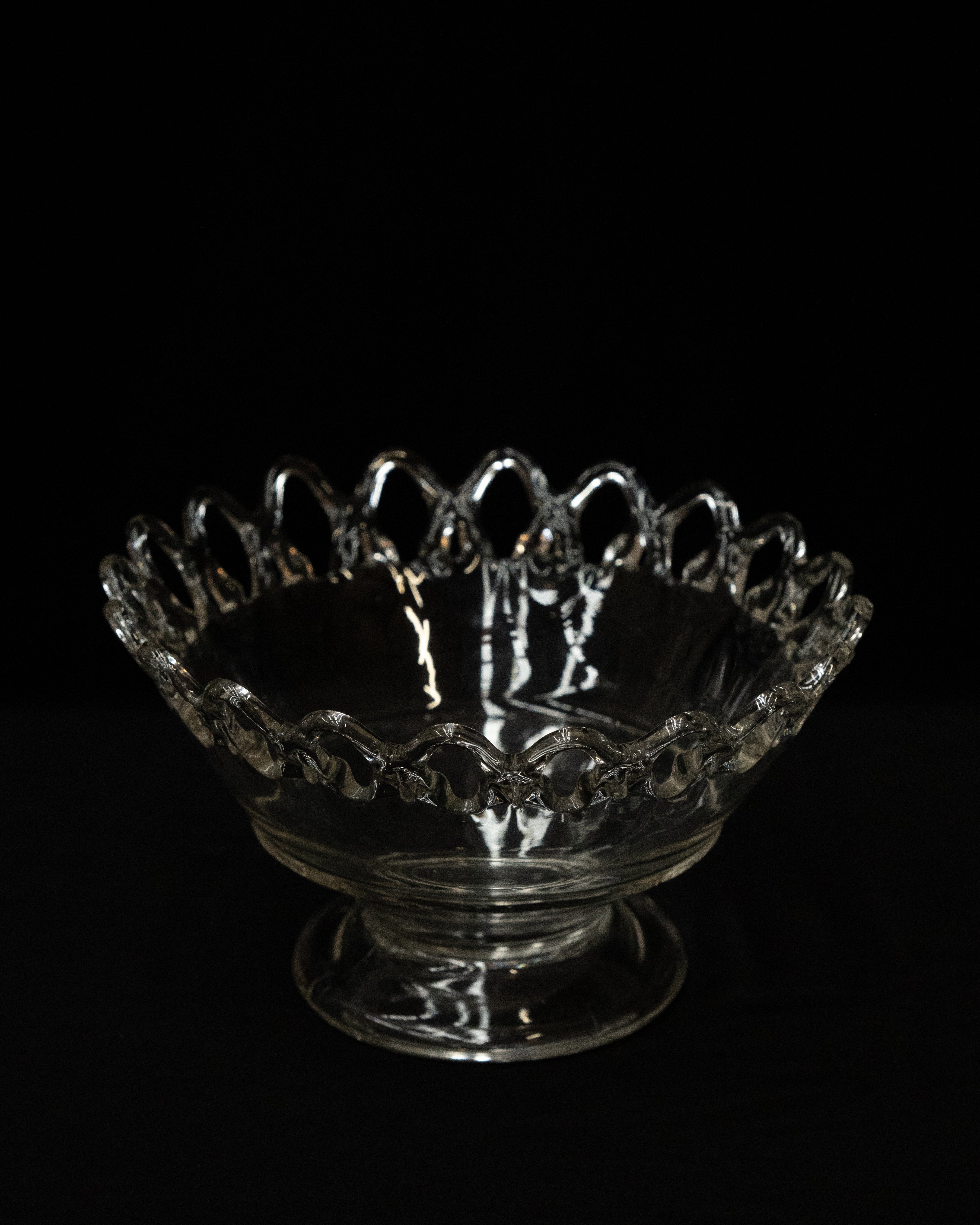 Clear art glass bowl with lace like details