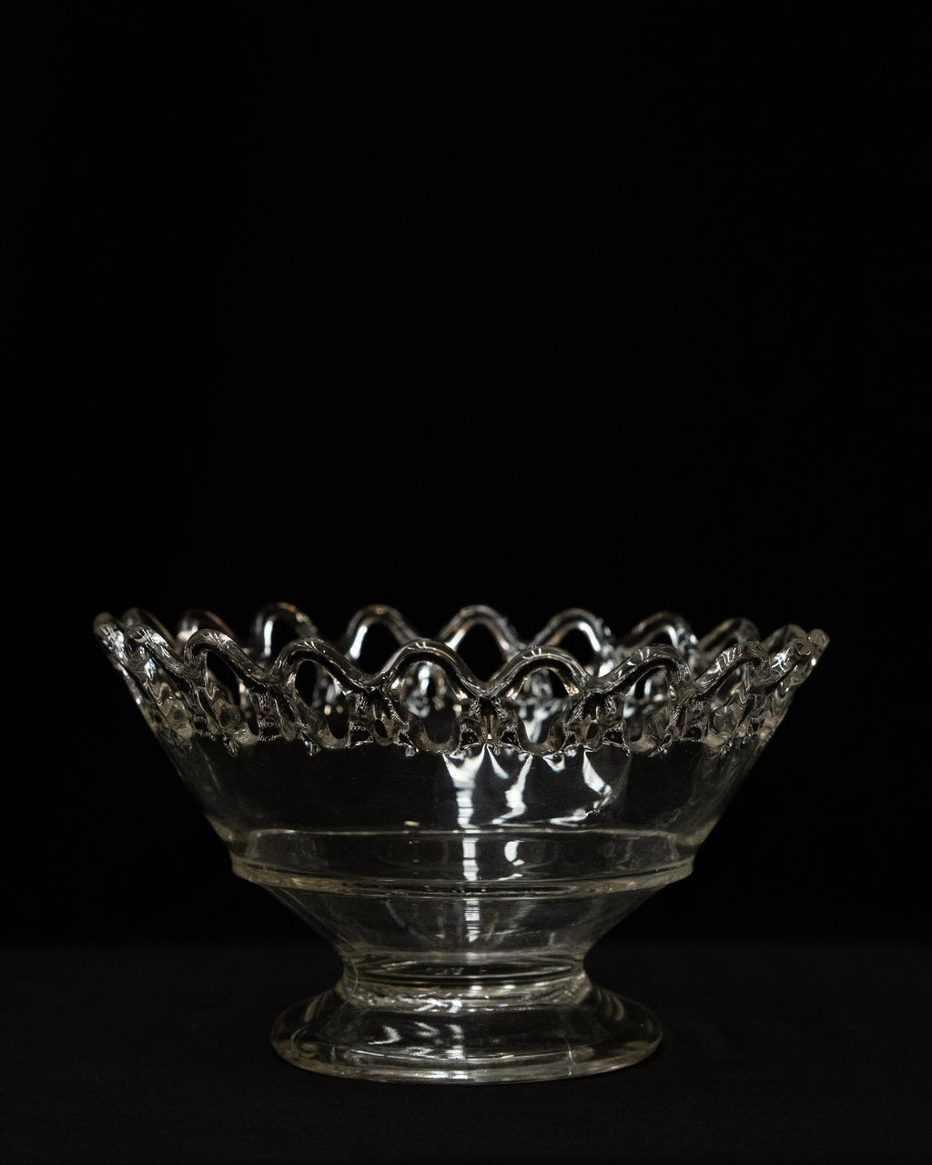 Clear art glass bowl with lace like details