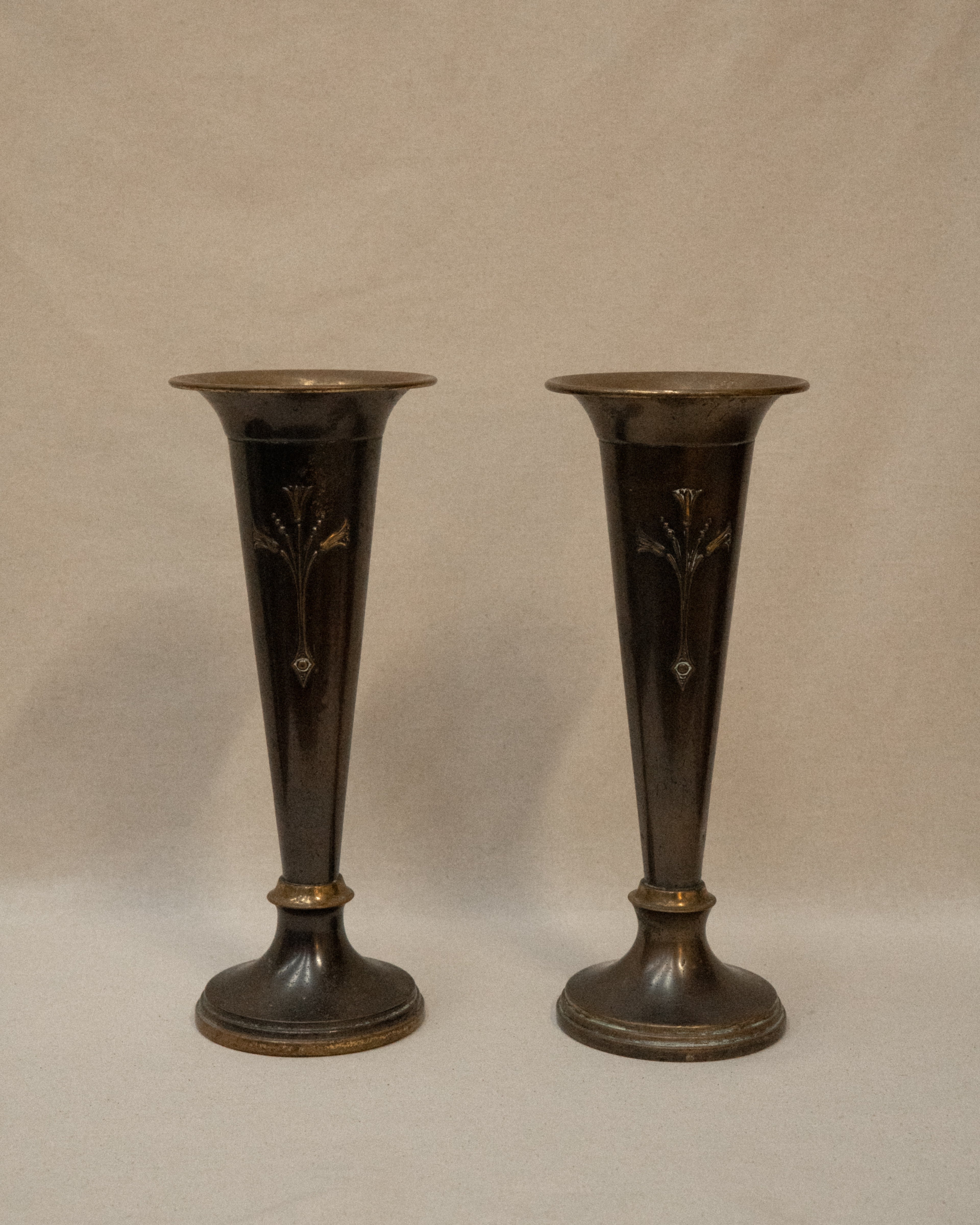 Pair of English Art Nouveau solid brass vases