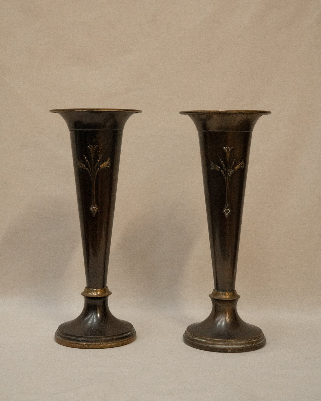 Pair of English Art Nouveau solid brass vases