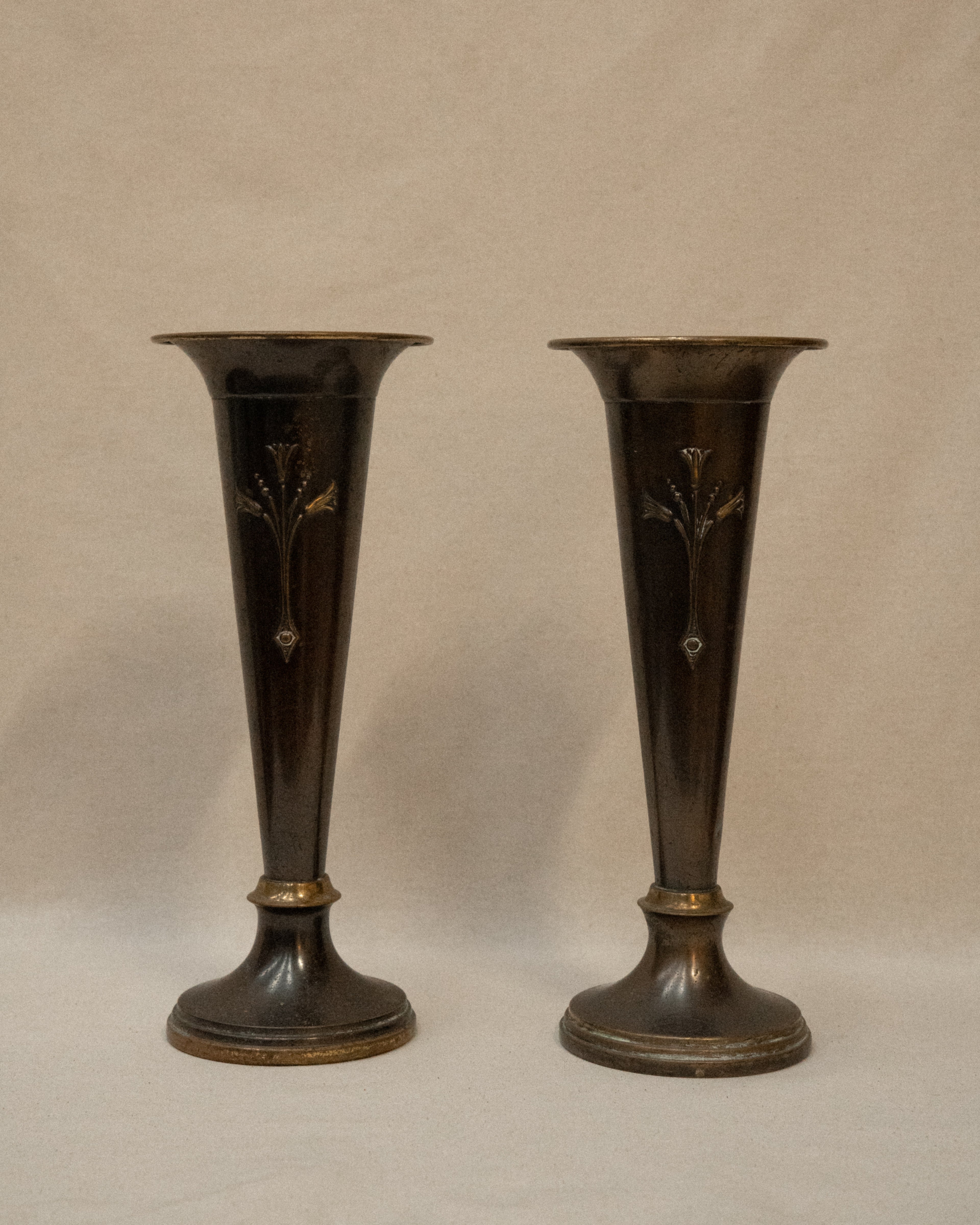 Pair of English Art Nouveau solid brass vases