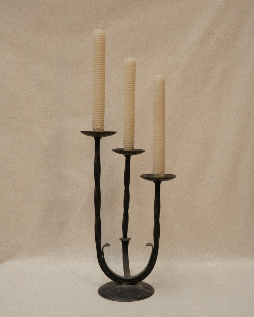 Wrought iron candelabra, holds 3