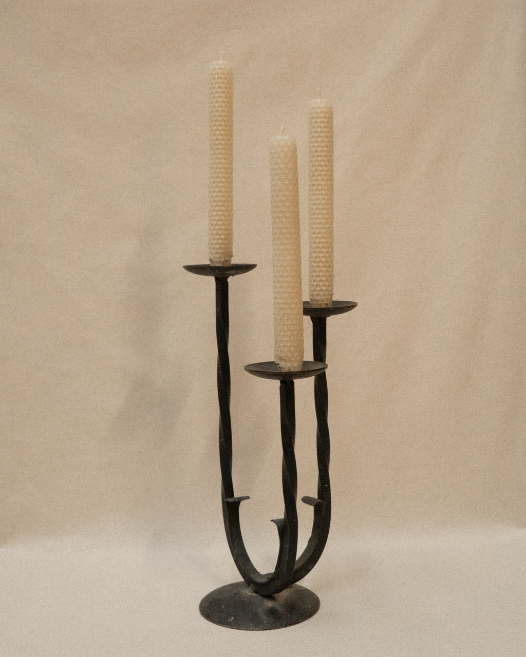 Wrought iron candelabra, holds 3