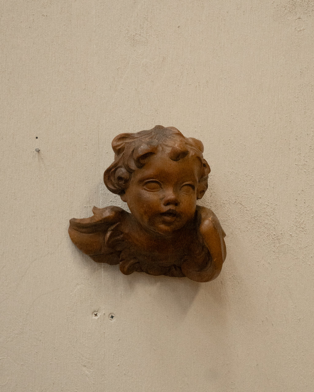 Carved wooden angel wall hanging