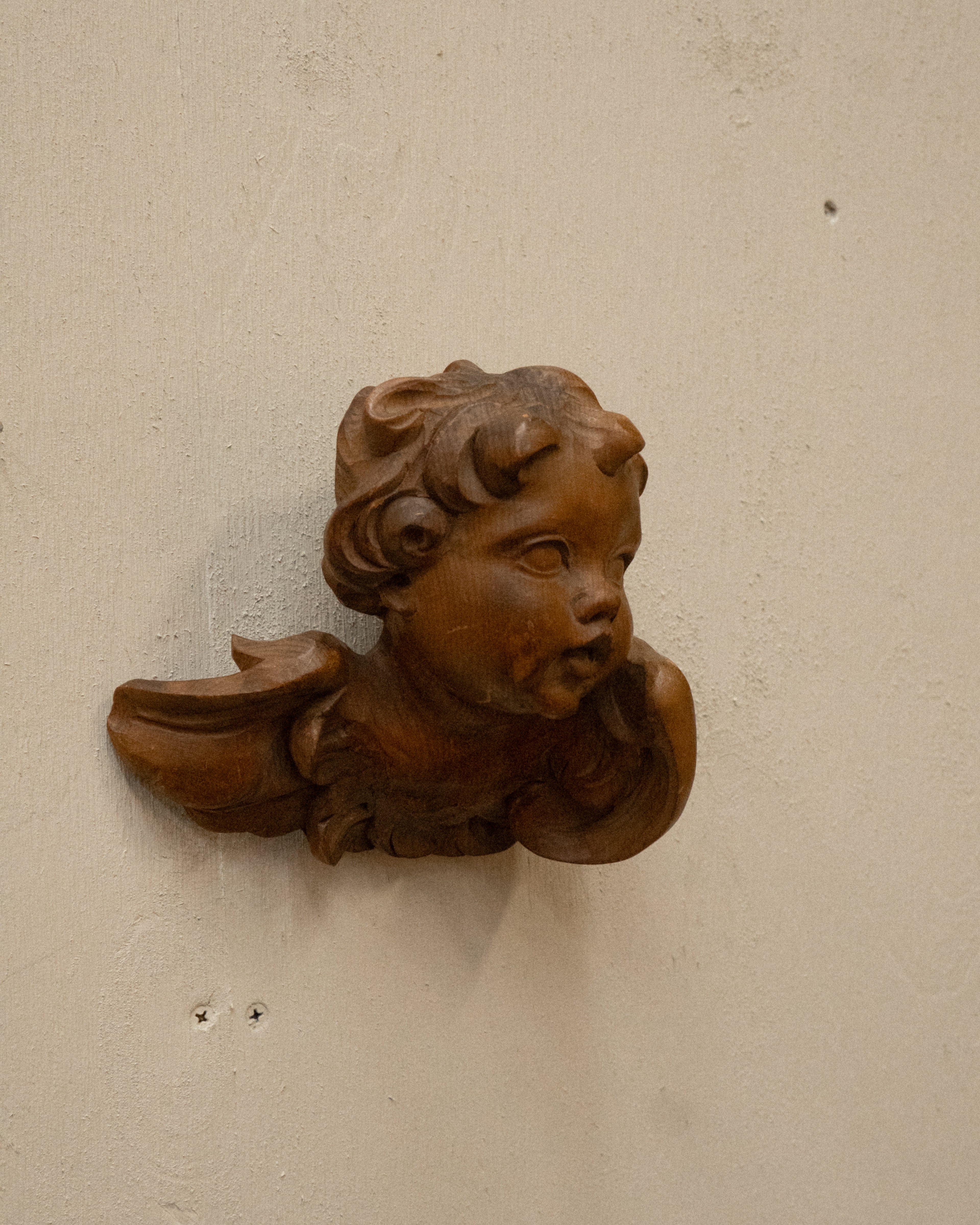Carved wooden angel wall hanging