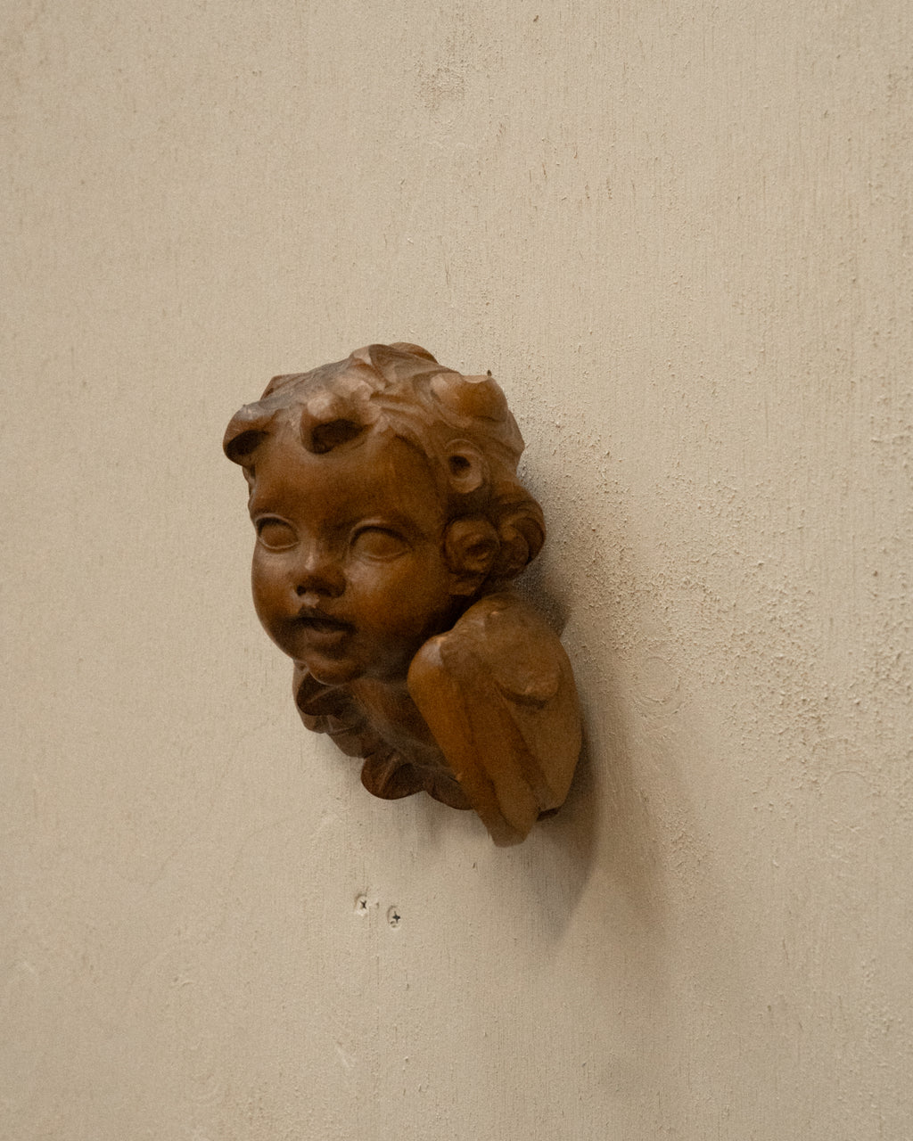 Carved wooden angel wall hanging