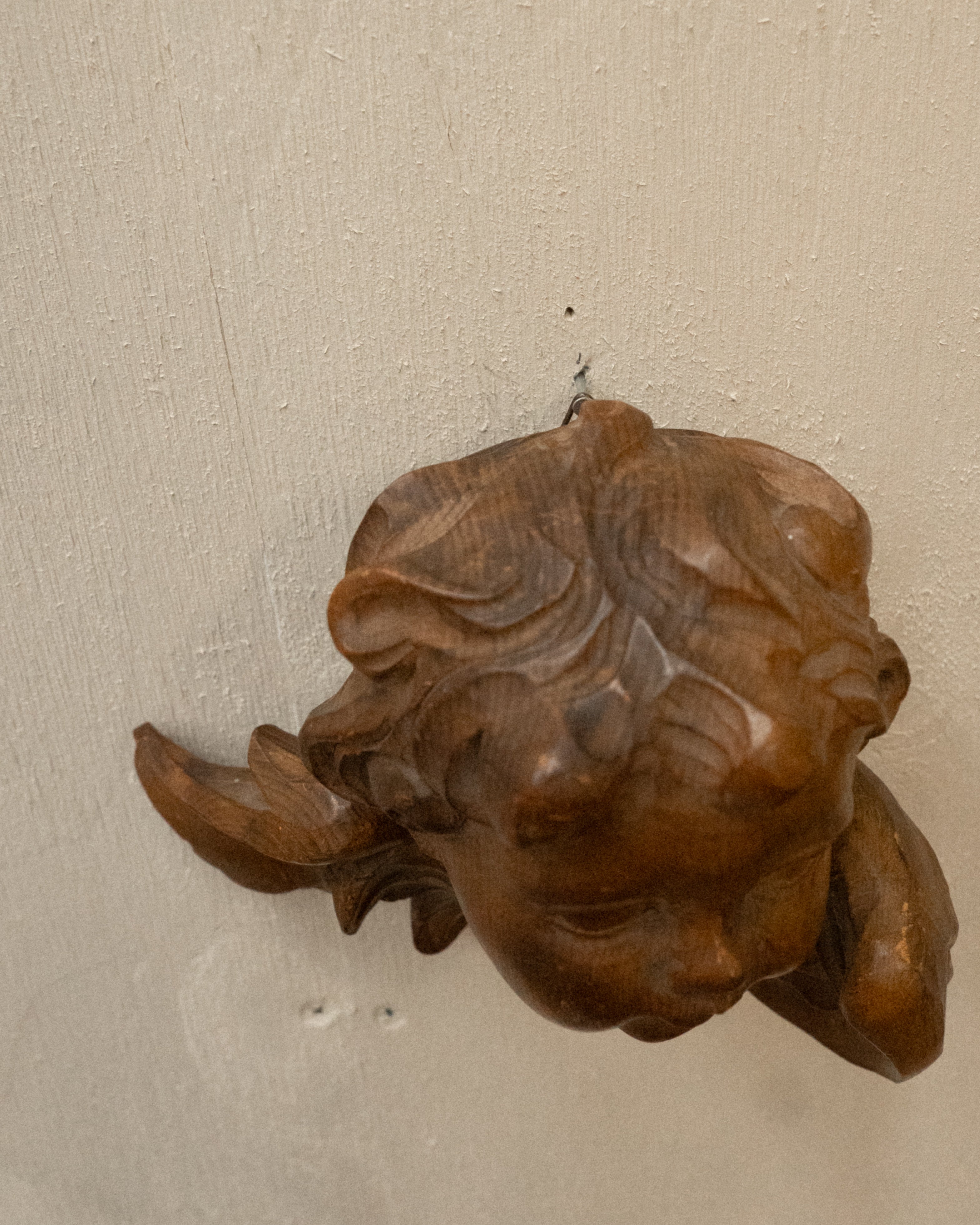 Carved wooden angel wall hanging
