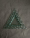 Pair of stackable triangle glass trays with spiral edges