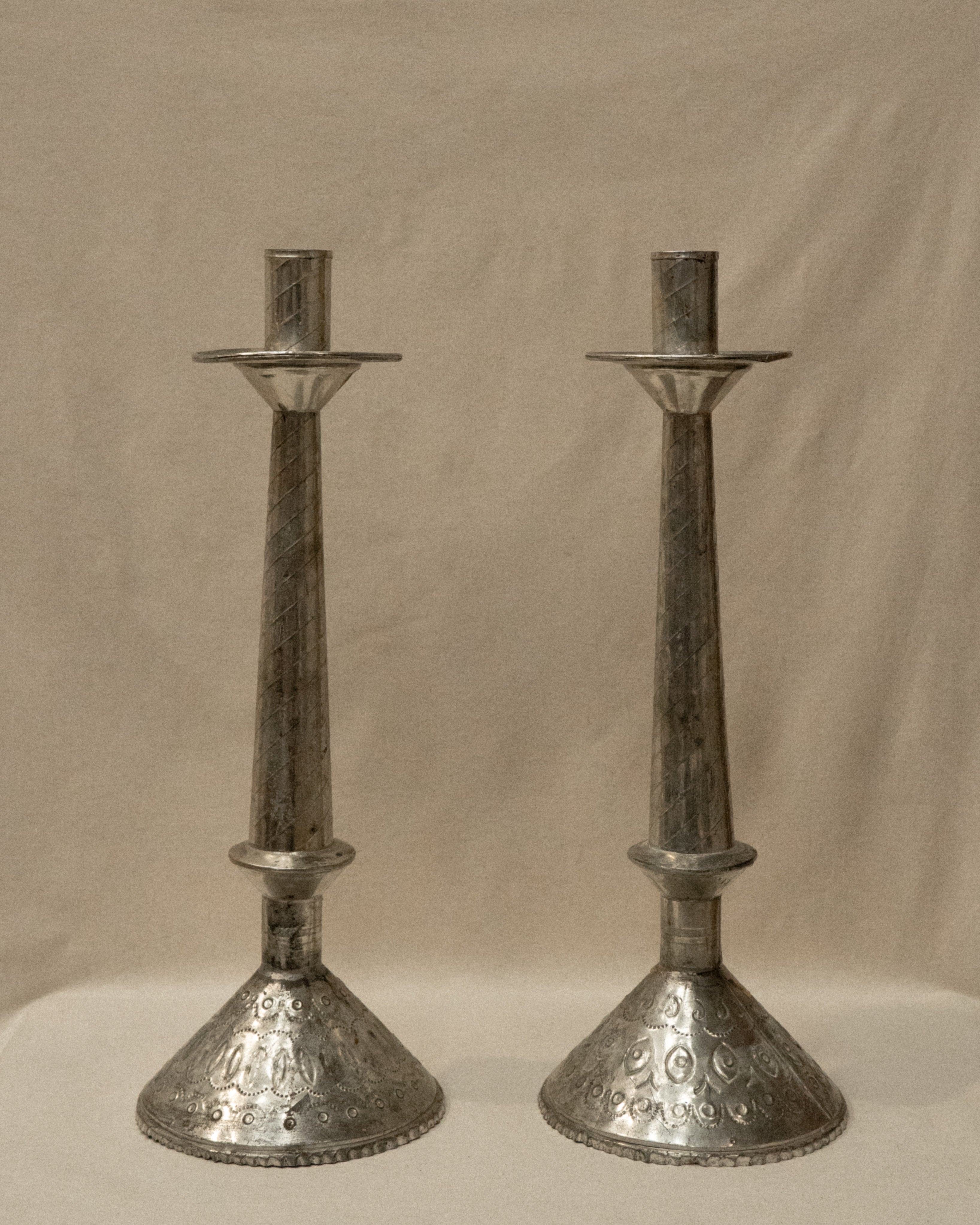 Mexican folk art punched tin candle holders