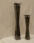 Pair of brutalist metal candle holder pedestals