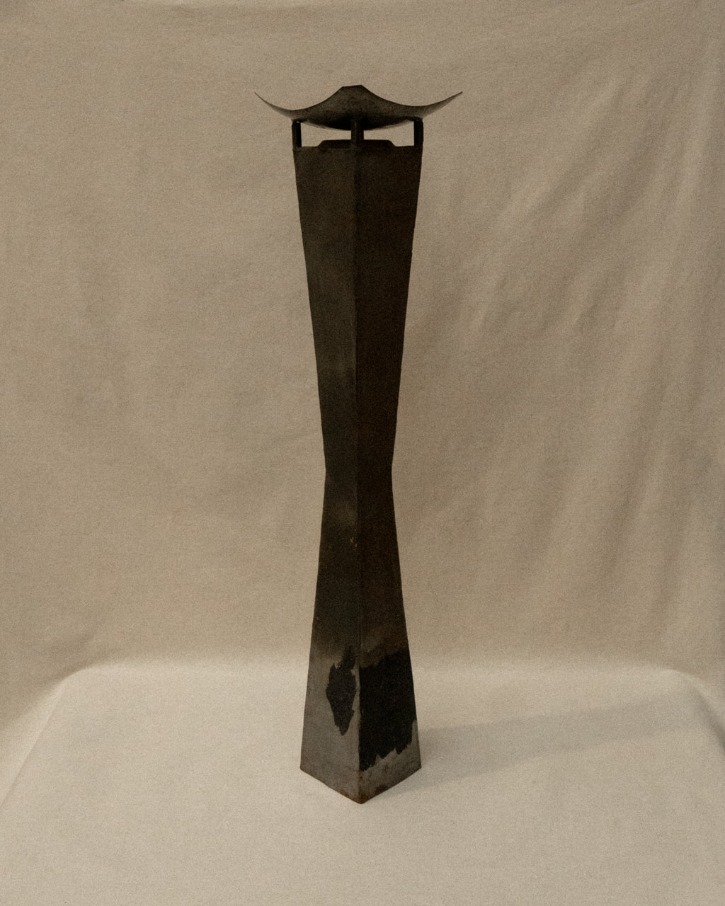 Pair of brutalist metal candle holder pedestals