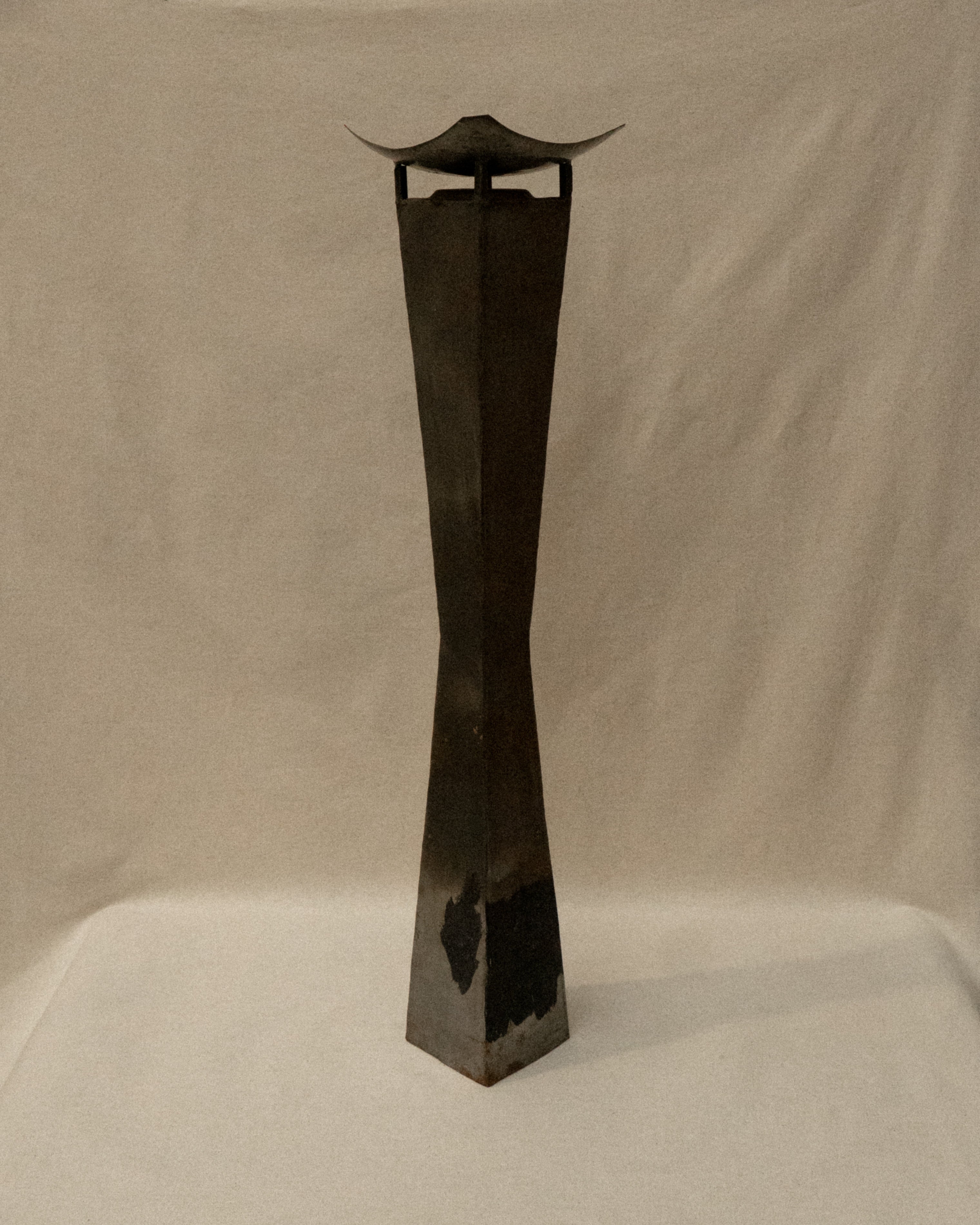Pair of brutalist metal candle holder pedestals