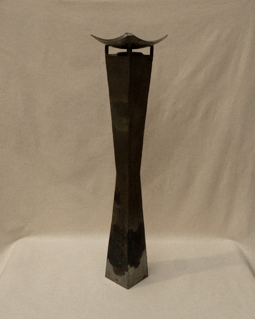 Pair of brutalist metal candle holder pedestals
