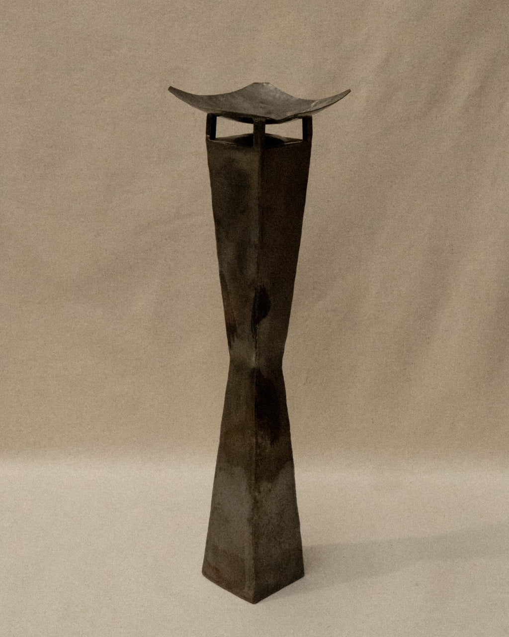 Pair of brutalist metal candle holder pedestals