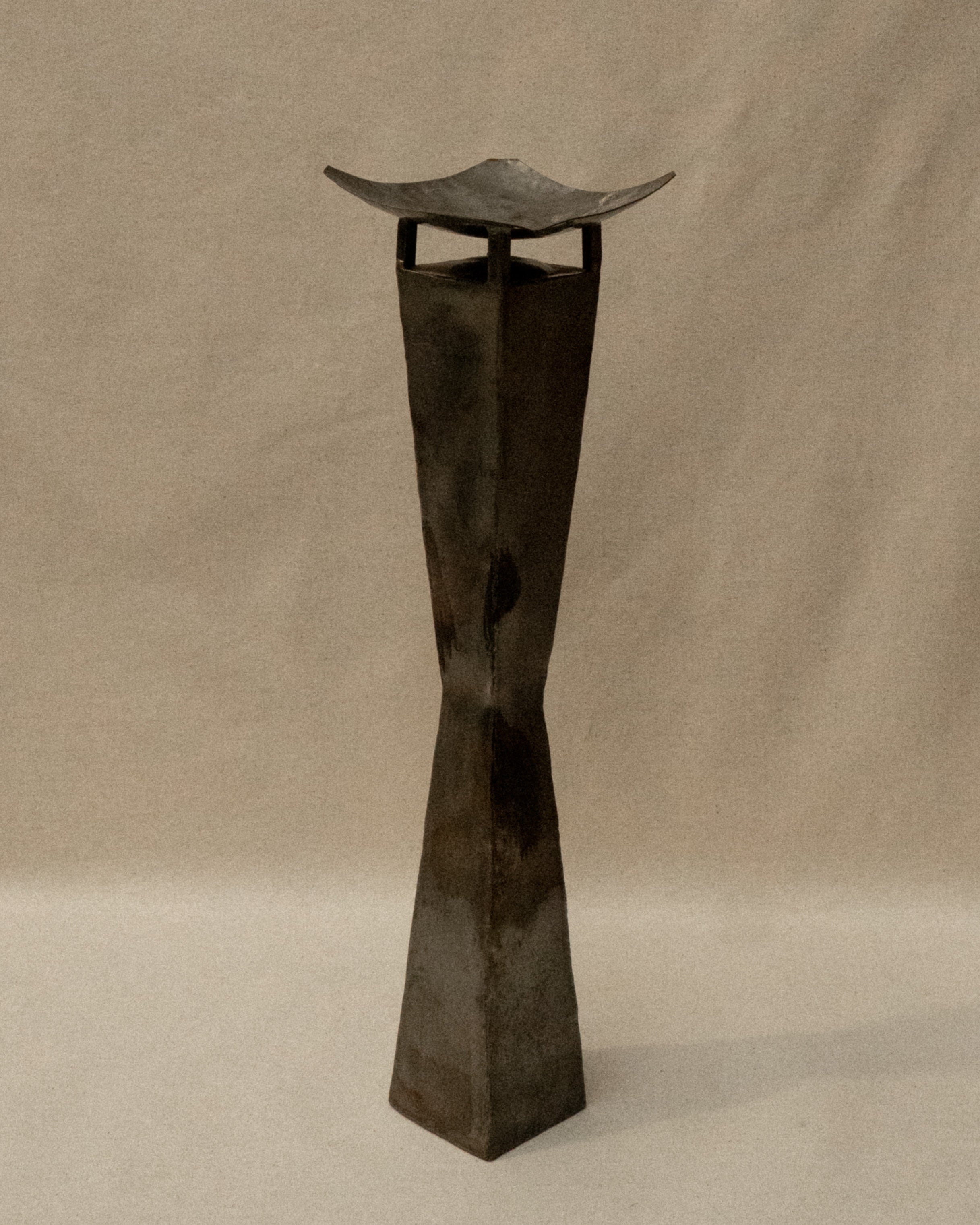 Pair of brutalist metal candle holder pedestals