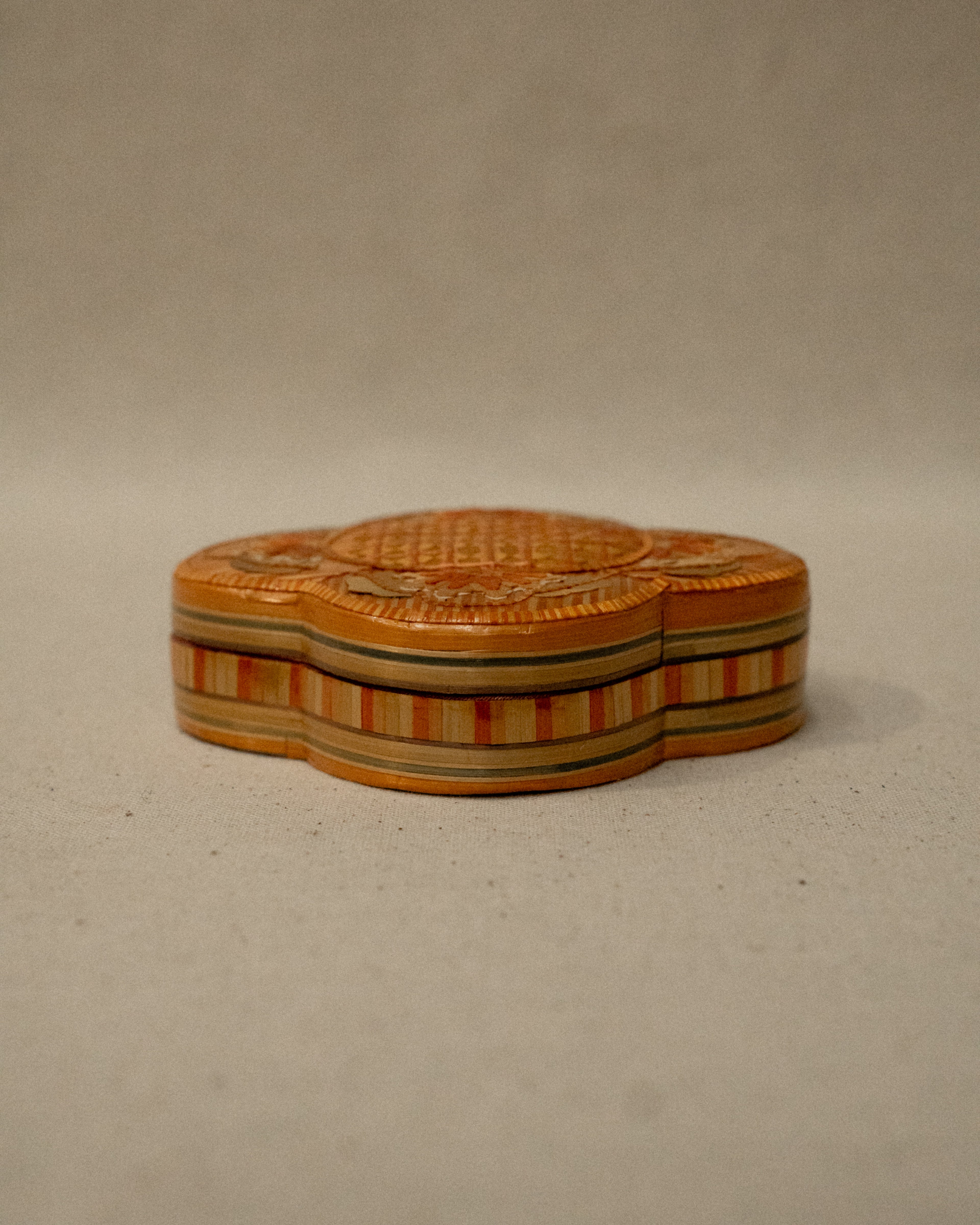 Straw trinket box lined with fabric