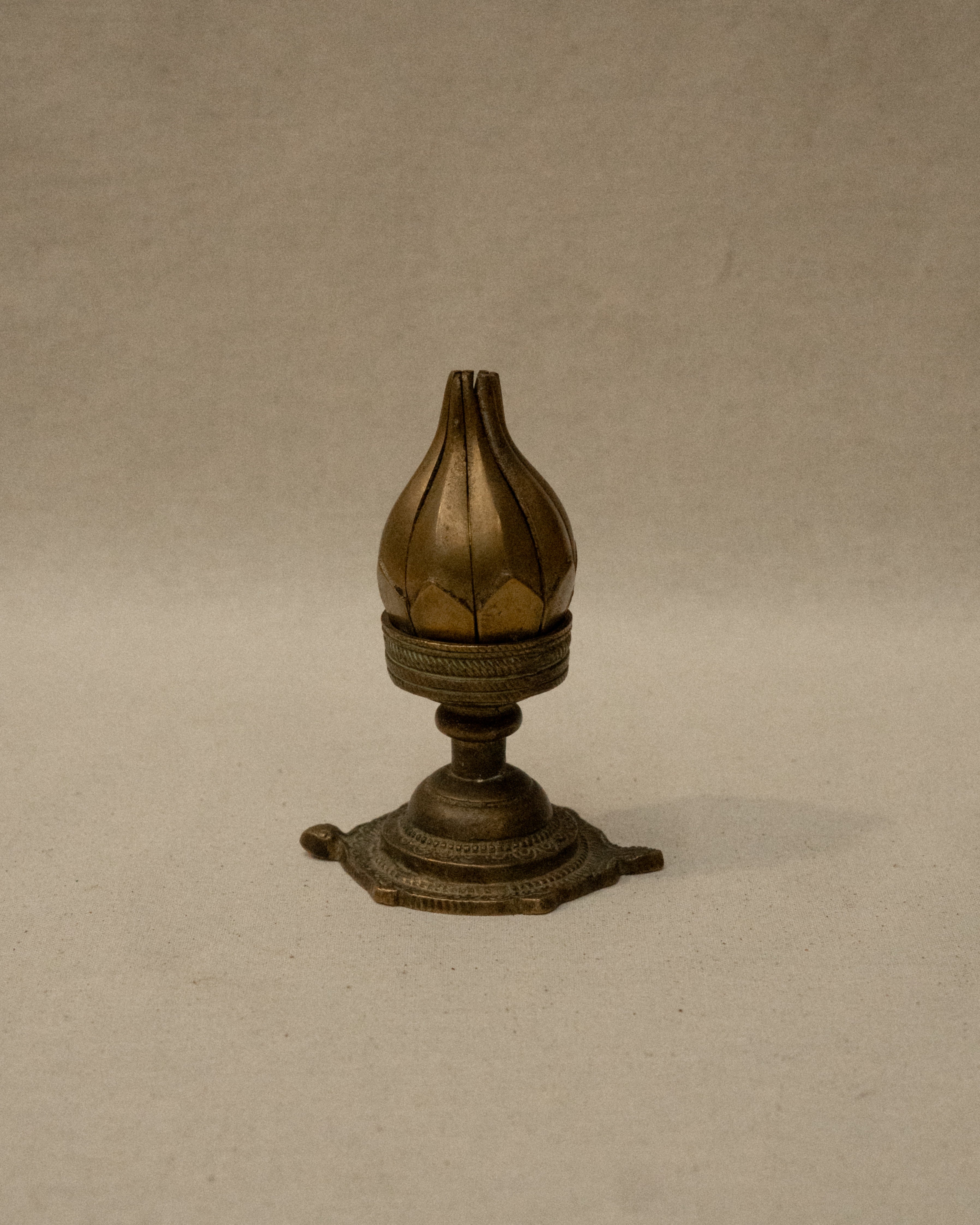 Brass lotus flower on tortoise incense/candle holder