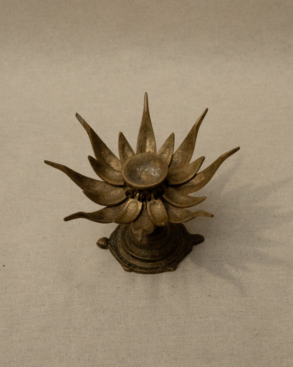 Brass lotus flower on tortoise incense/candle holder