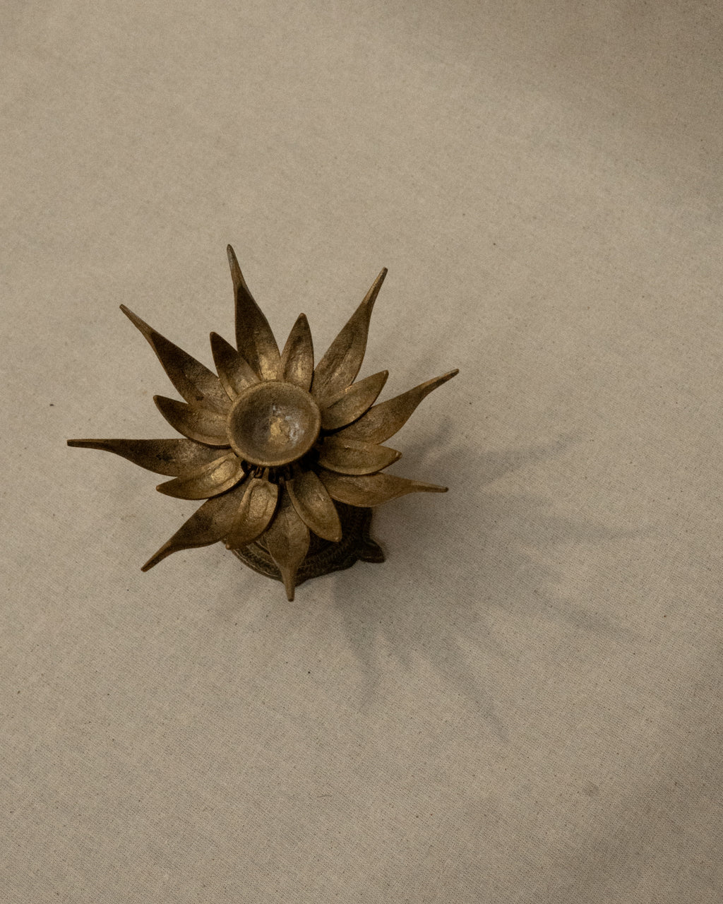Brass lotus flower on tortoise incense/candle holder