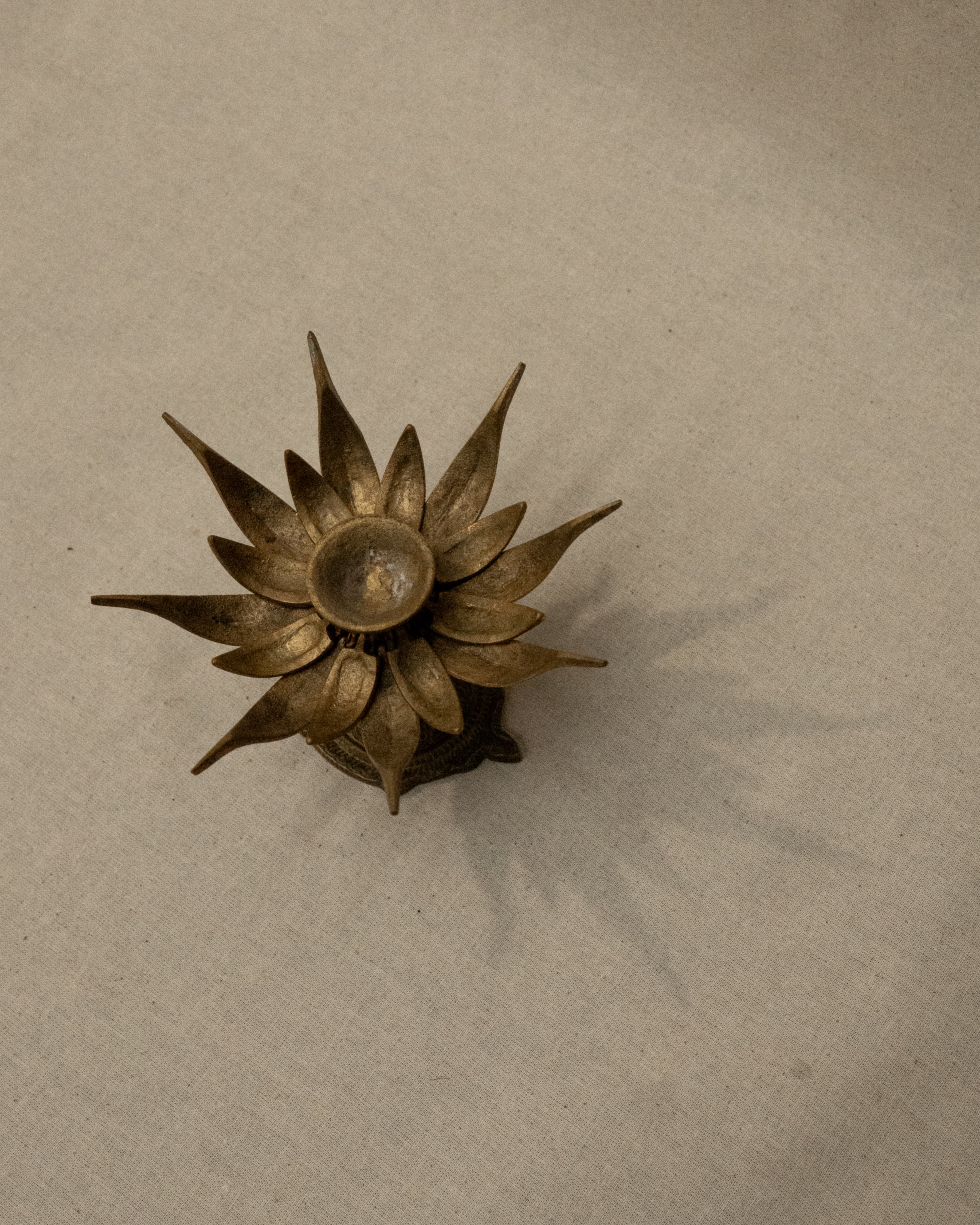 Brass lotus flower on tortoise incense/candle holder