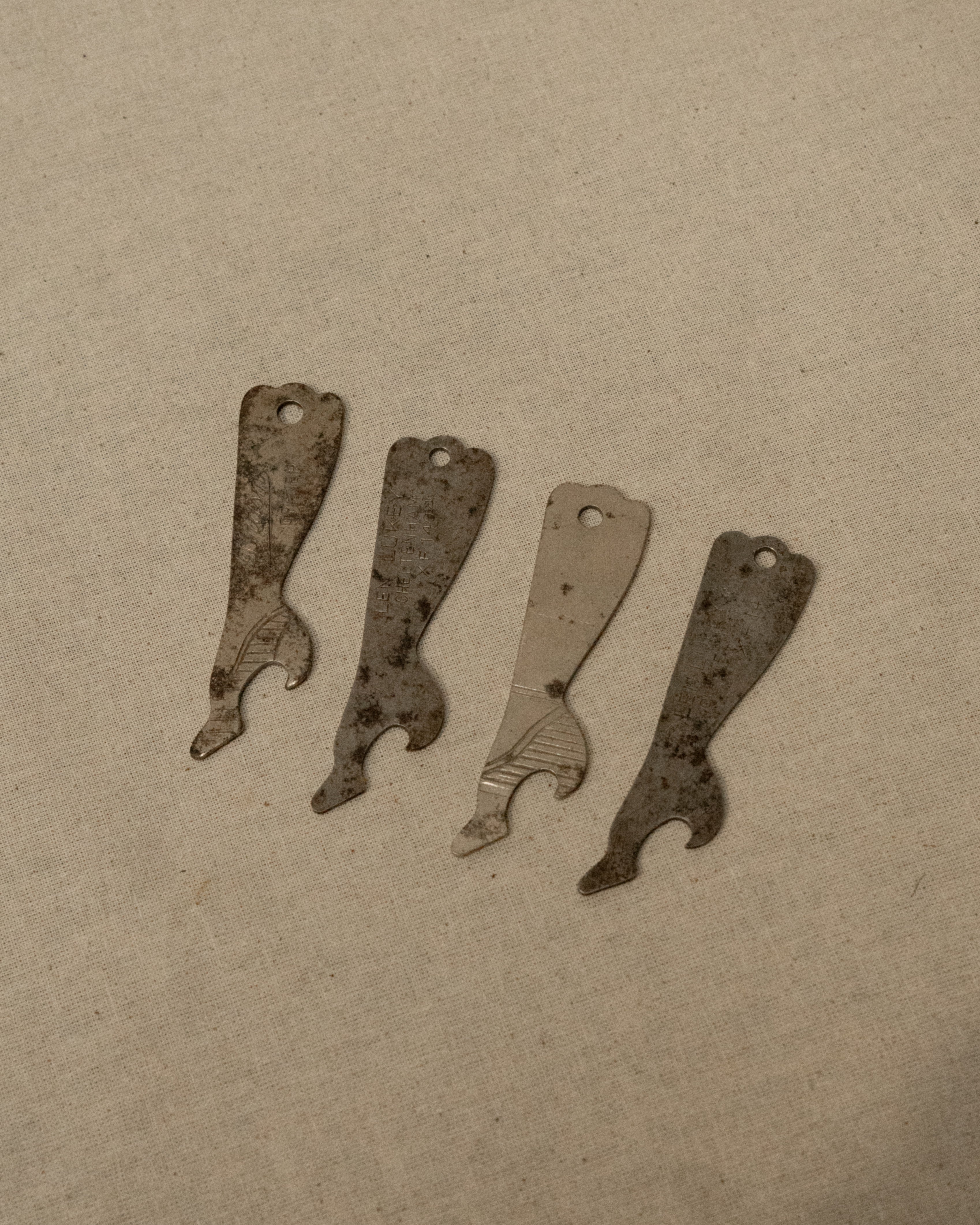 1950s metal leg and heel bottle opener