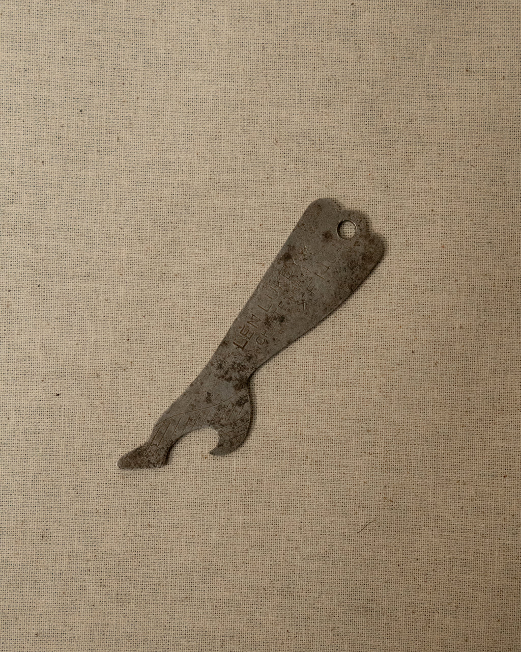 1950s metal leg and heel bottle opener