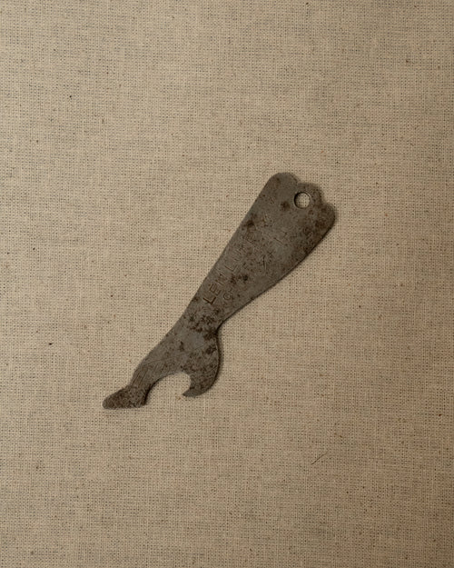 1950s metal leg and heel bottle opener