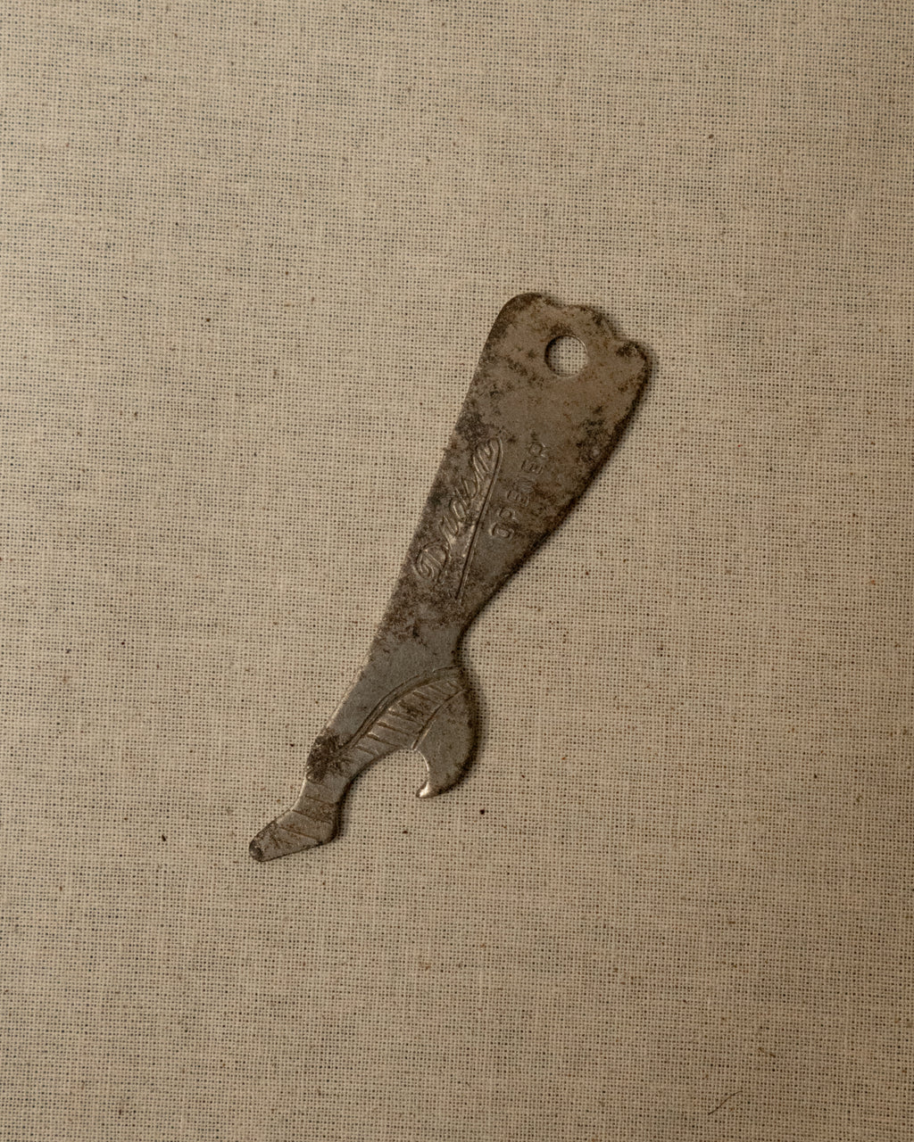 1950s metal leg and heel bottle opener