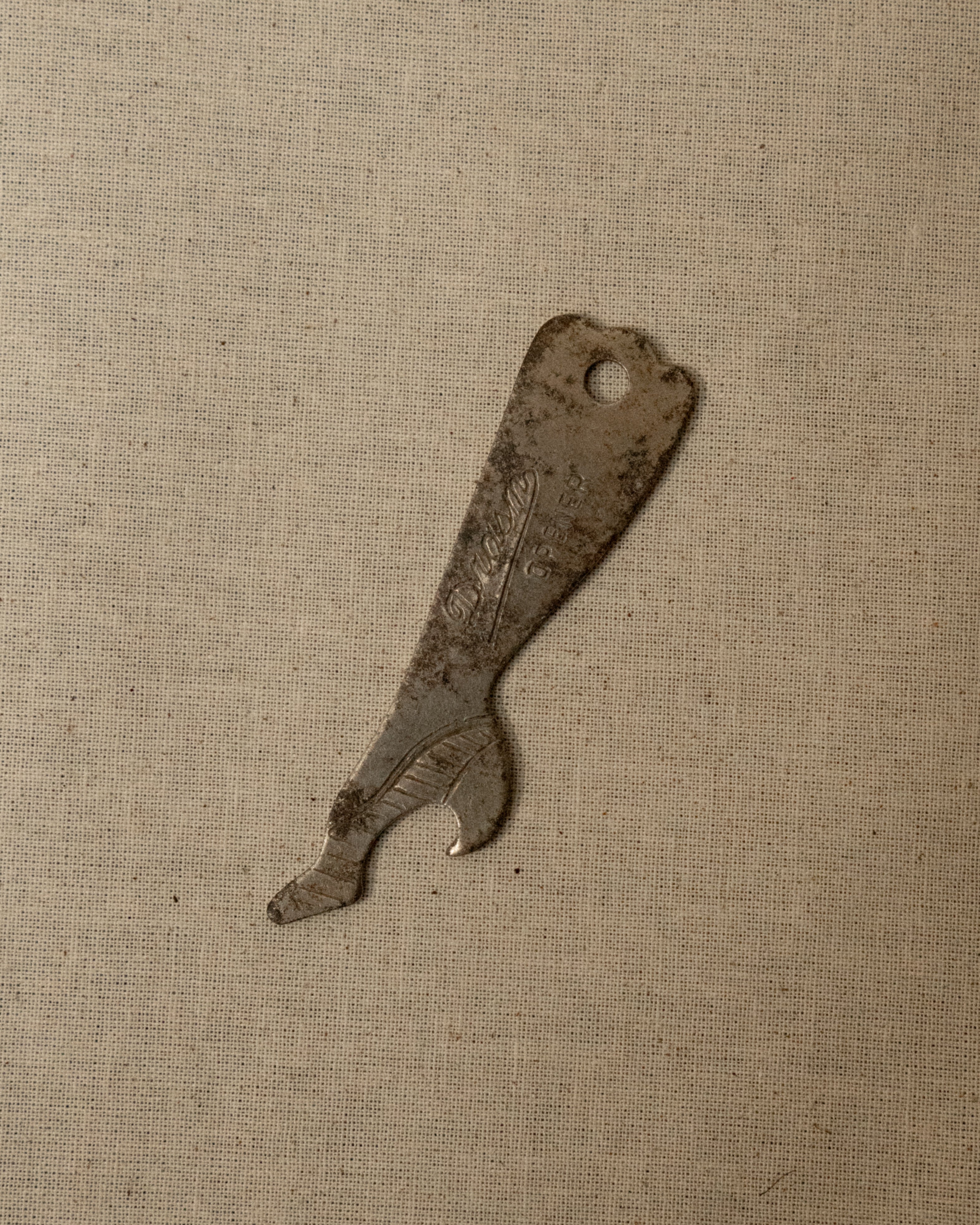 1950s metal leg and heel bottle opener