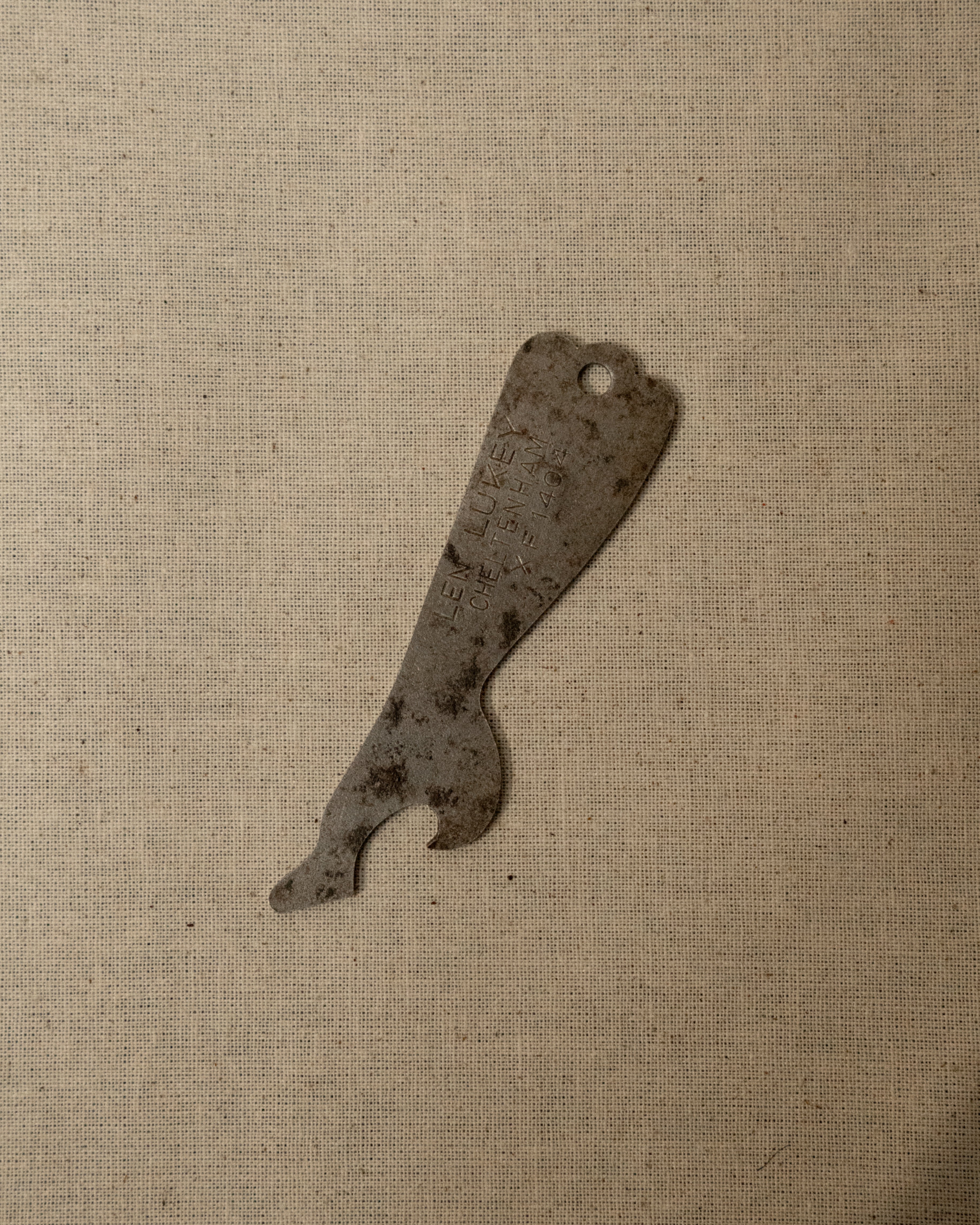 1950s metal leg and heel bottle opener