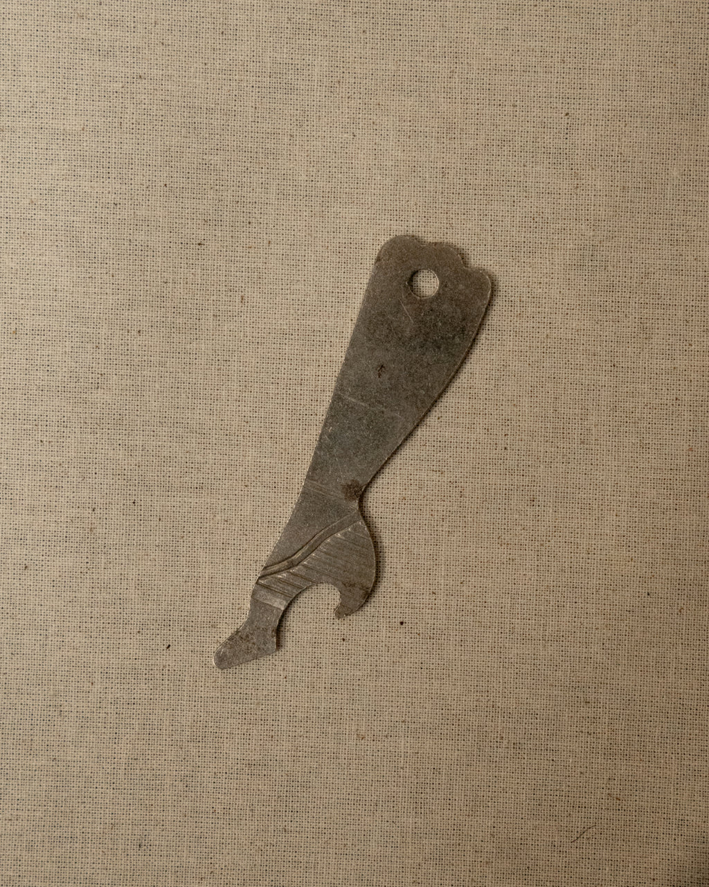 1950s metal leg and heel bottle opener