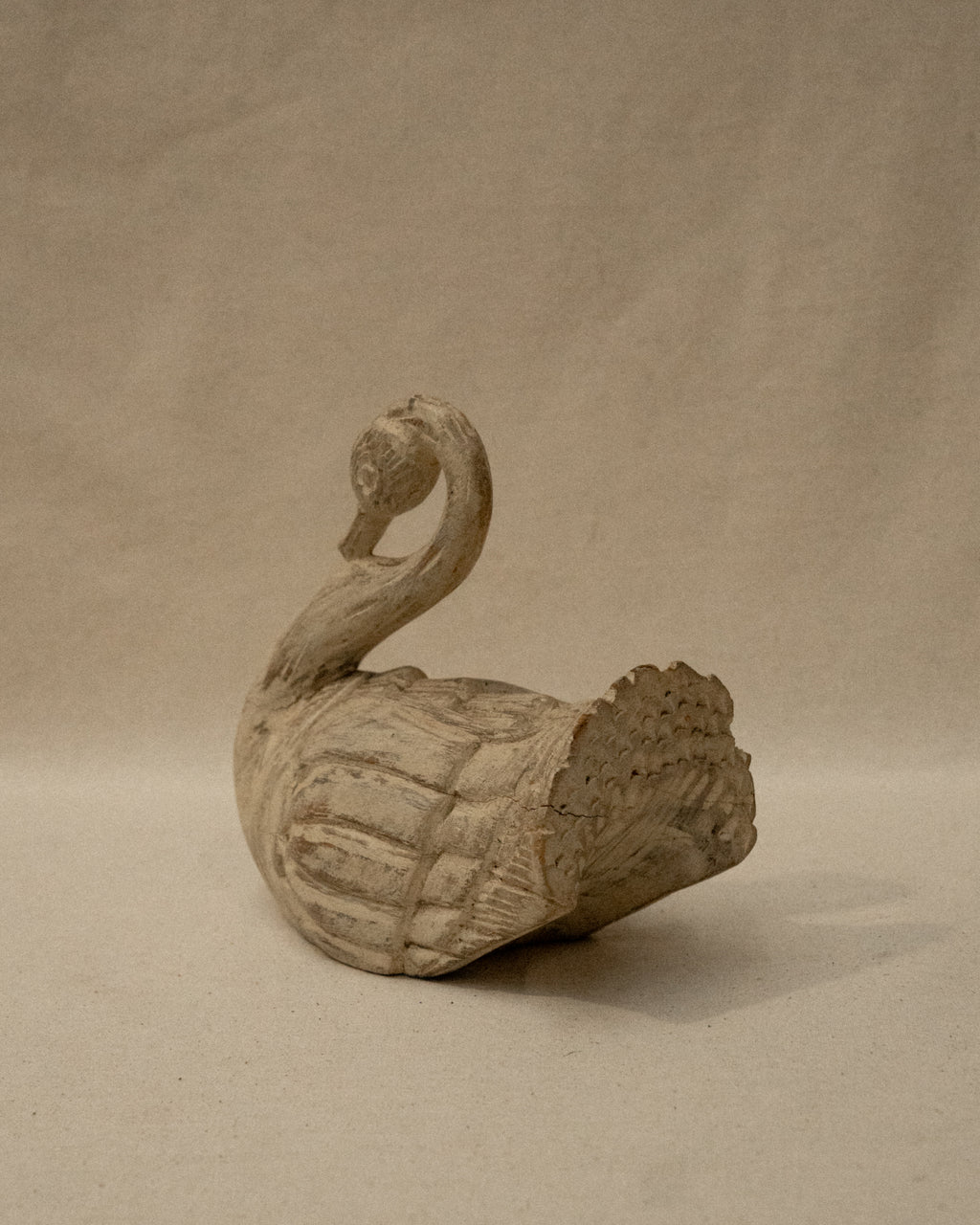 White wooden folk art swan