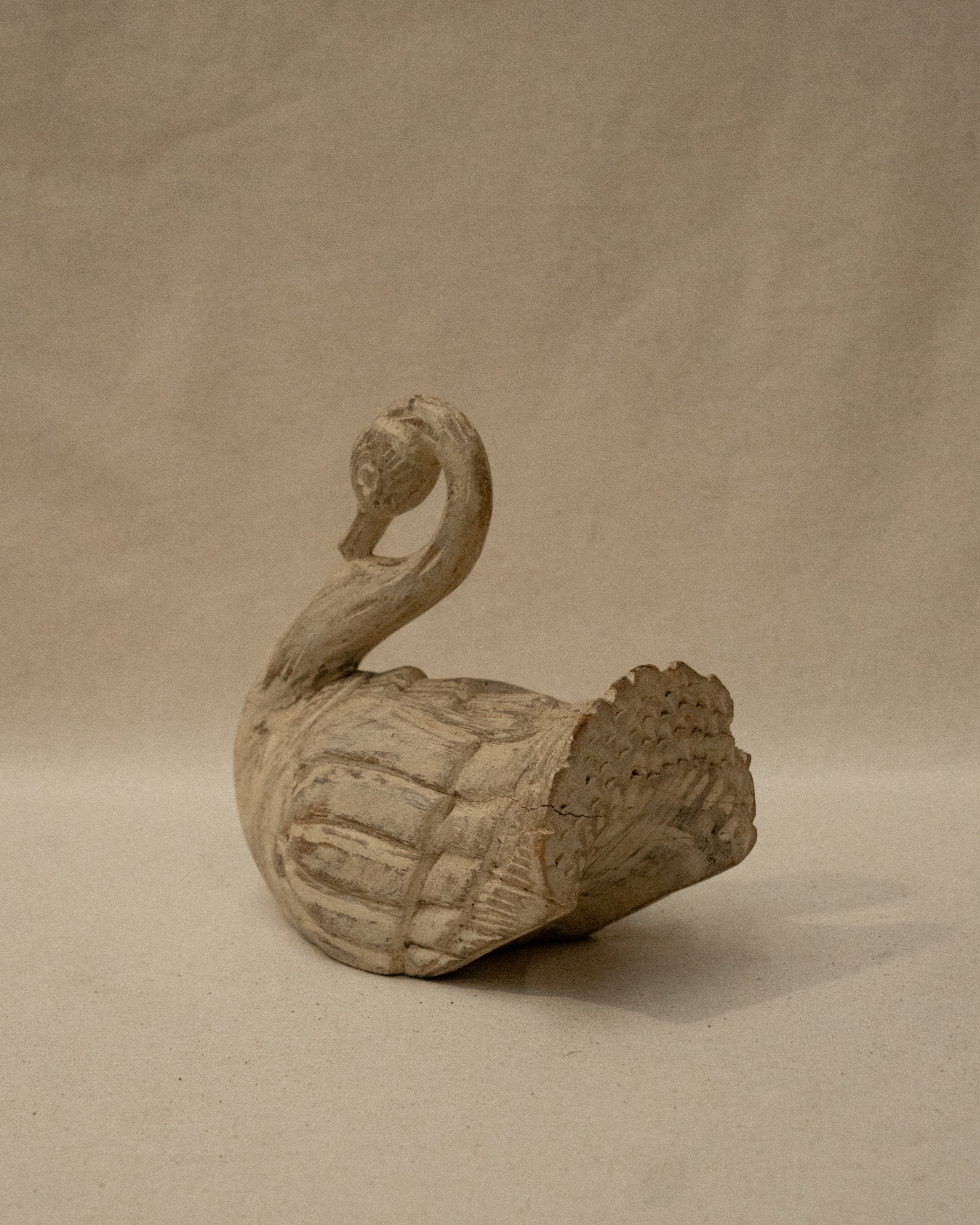 White wooden folk art swan