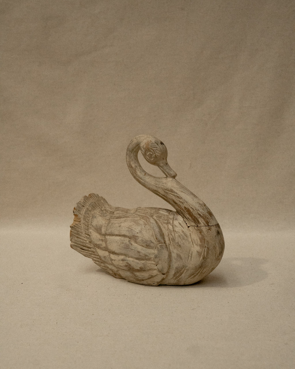 White wooden folk art swan