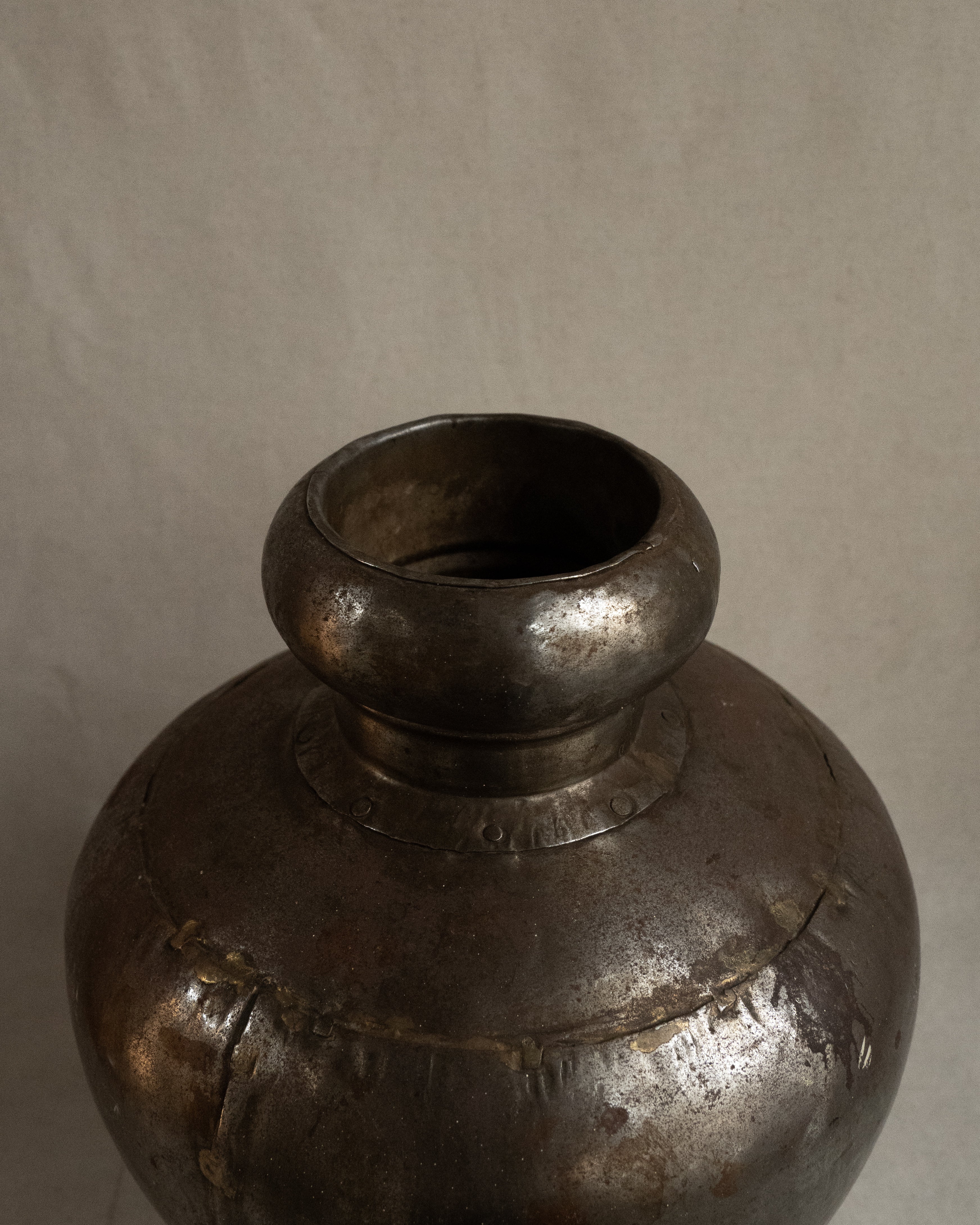 Indian water vessel with silvery tone and brass solder