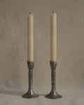 Pair of tulip pewter candle holders