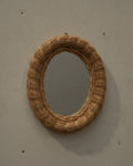 Woven rattan wall mirror