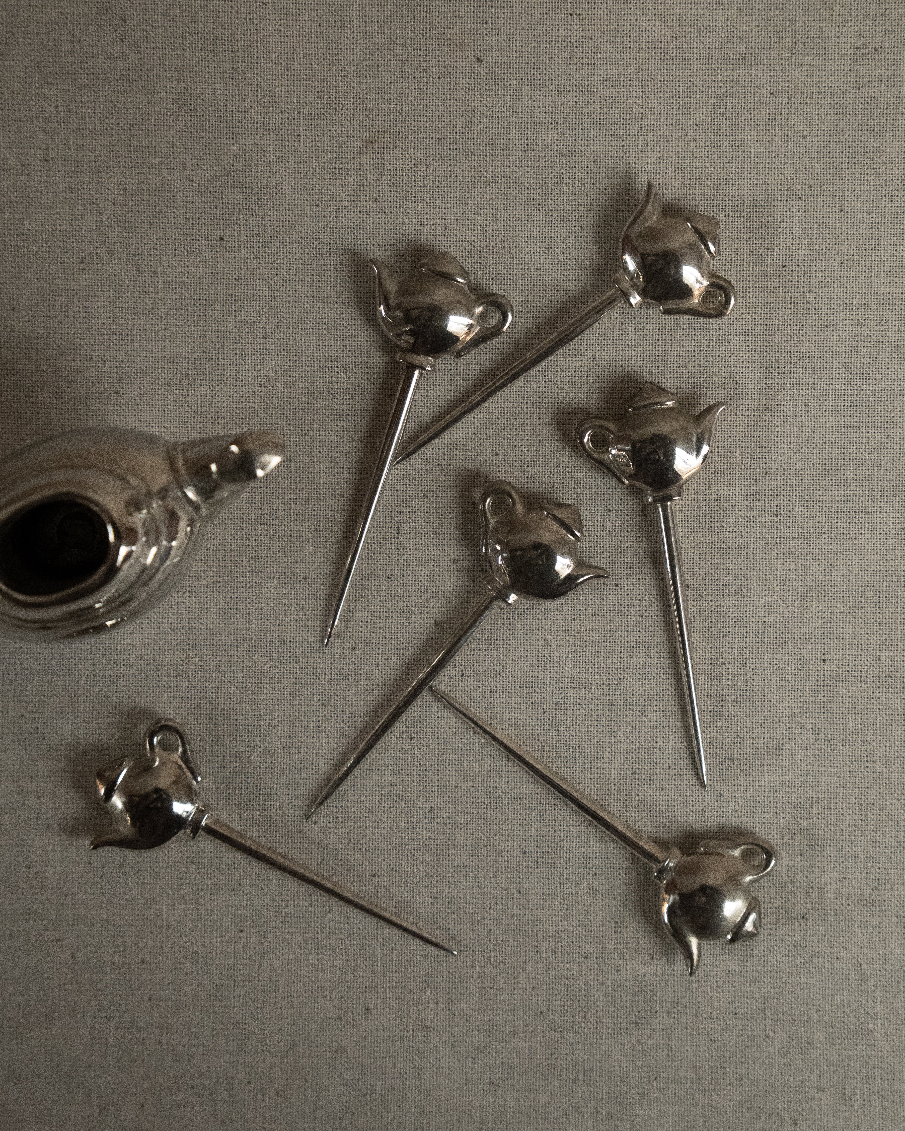 Chrome teapot with toothpicks