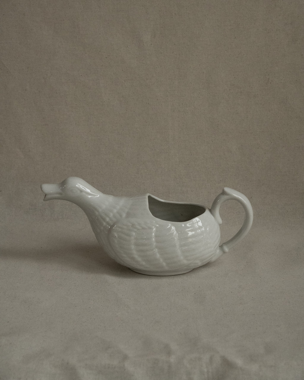White ceramic duck sauce pitcher