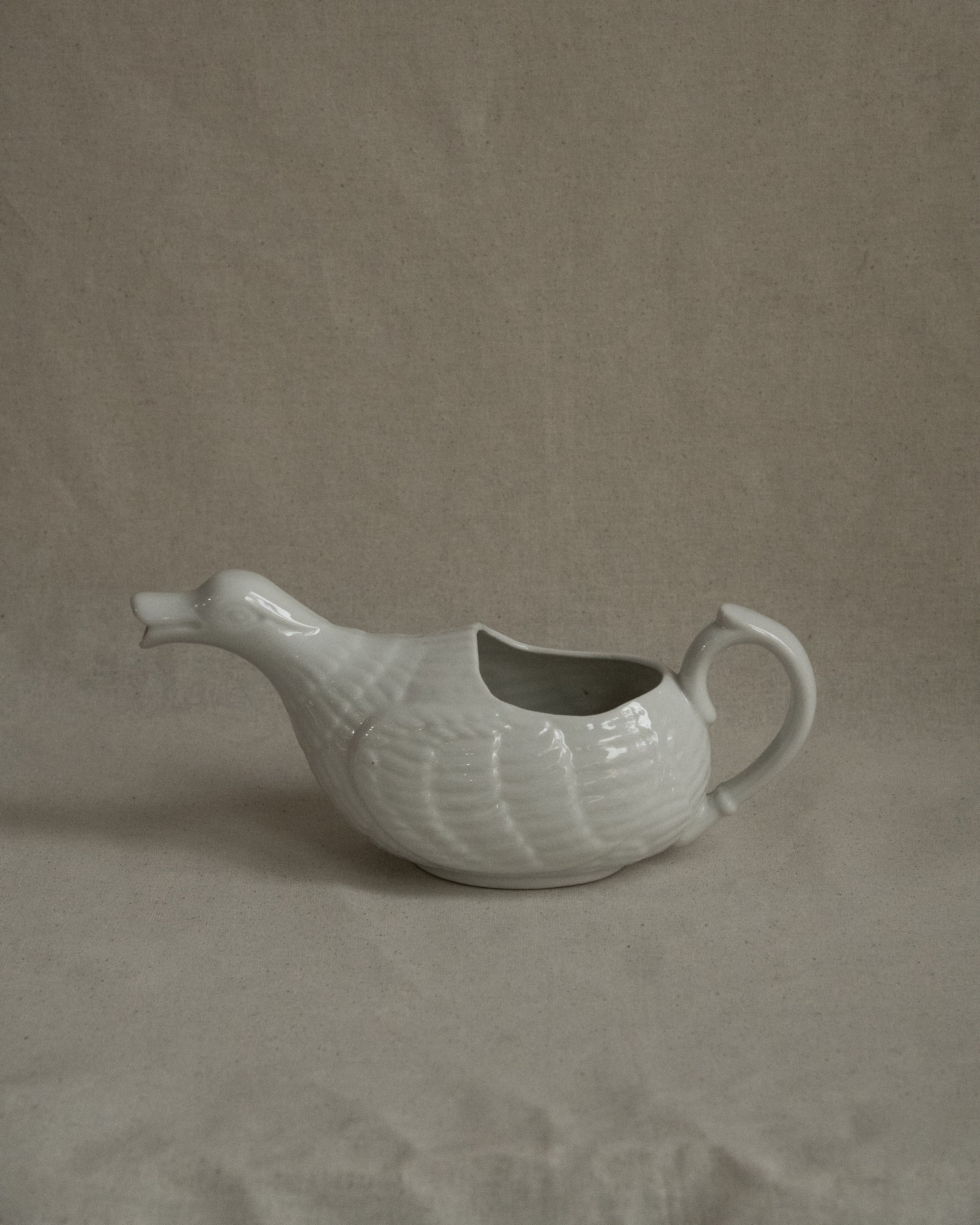 White ceramic duck sauce pitcher