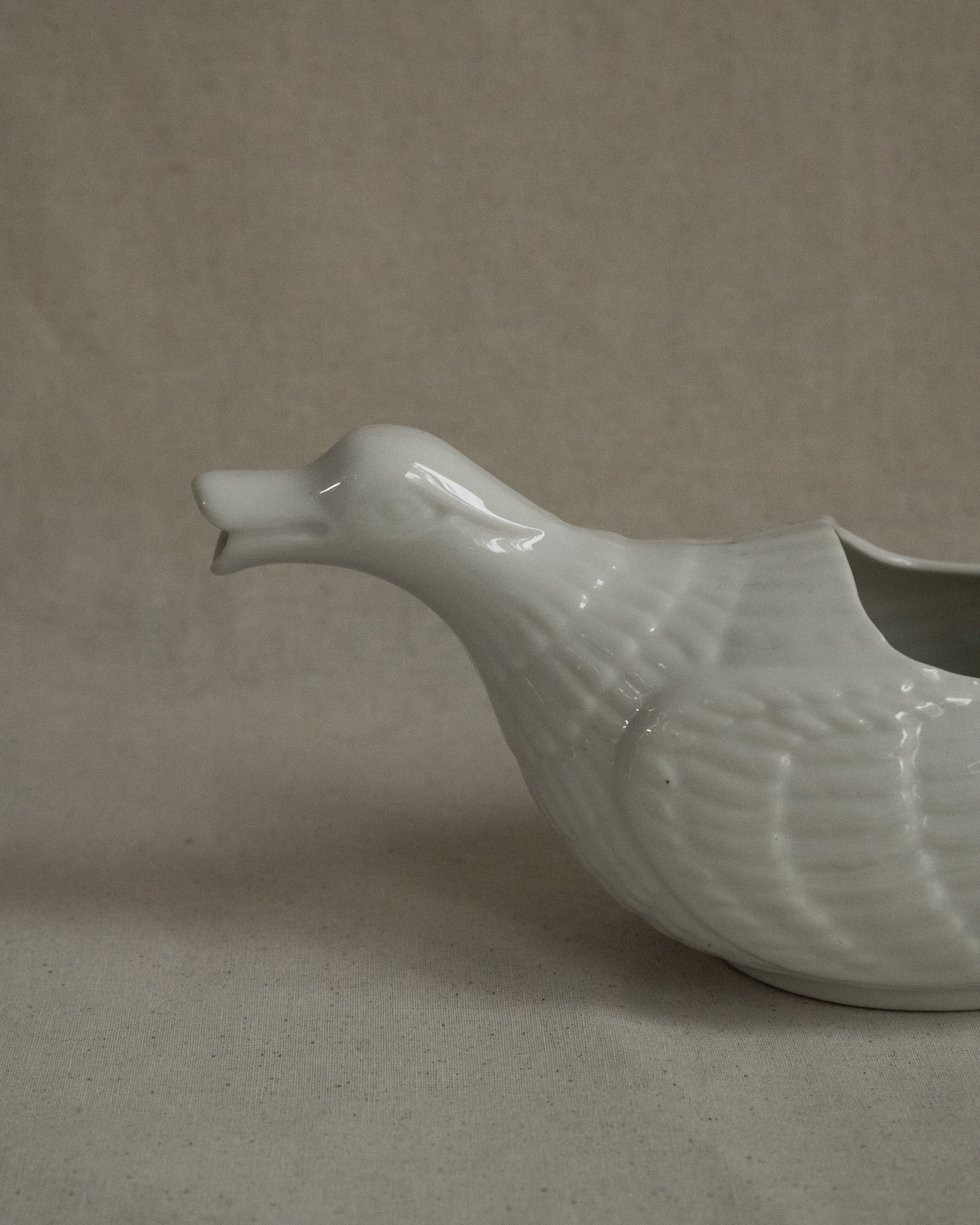 White ceramic duck sauce pitcher