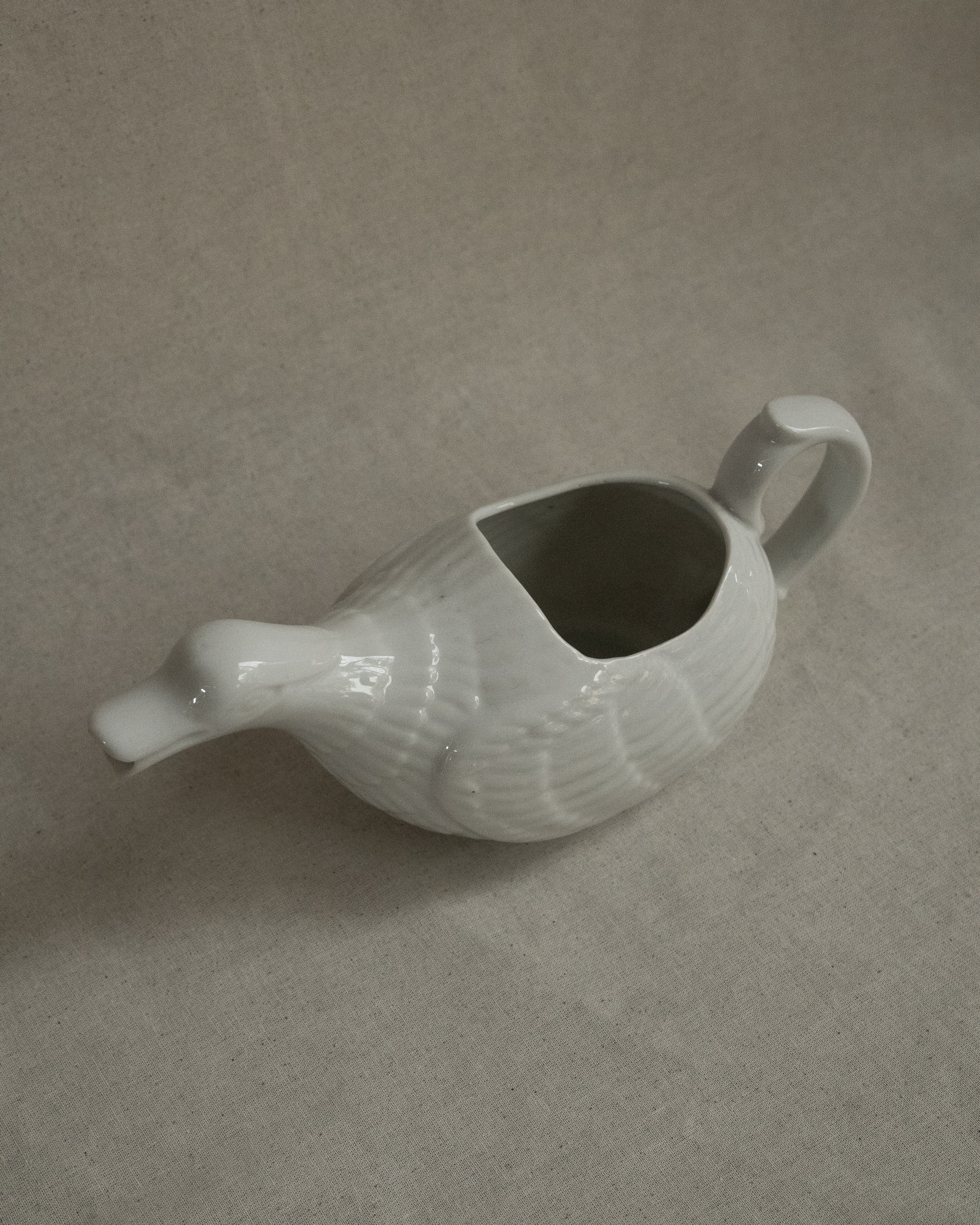 White ceramic duck sauce pitcher