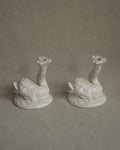 Pair of white ceramic fish candle holders
