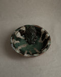 Ceramic bowl with green blue white brown hues