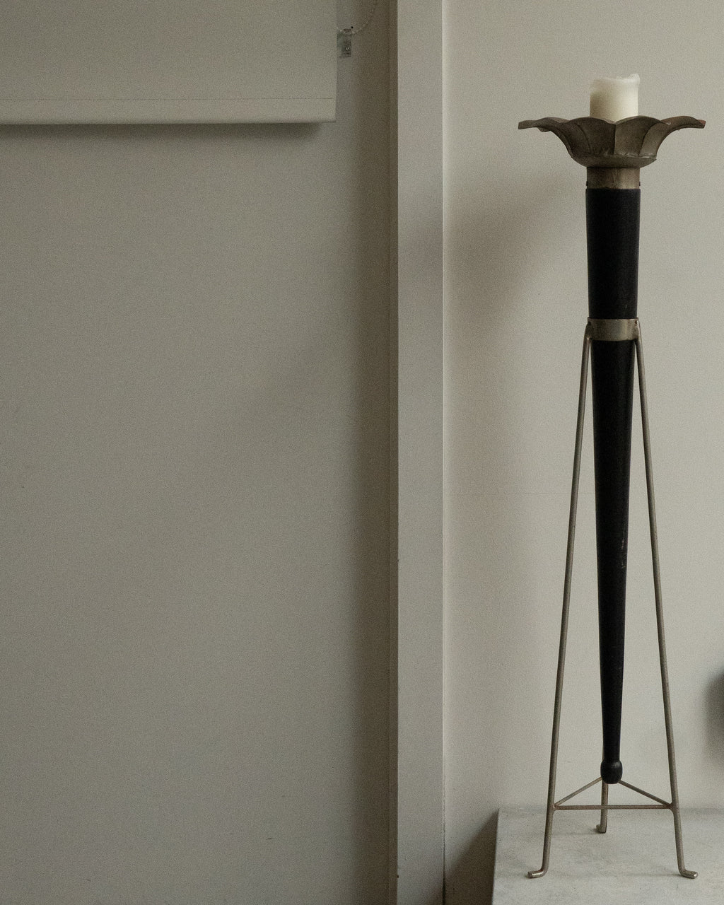 Sculptural pillar candle holder